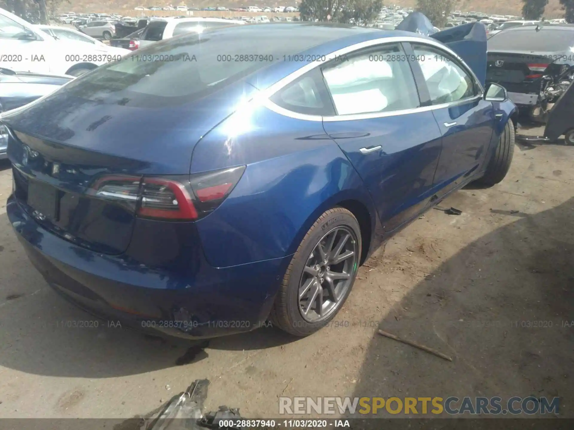 4 Photograph of a damaged car 5YJ3E1EA5LF743684 TESLA MODEL 3 2020