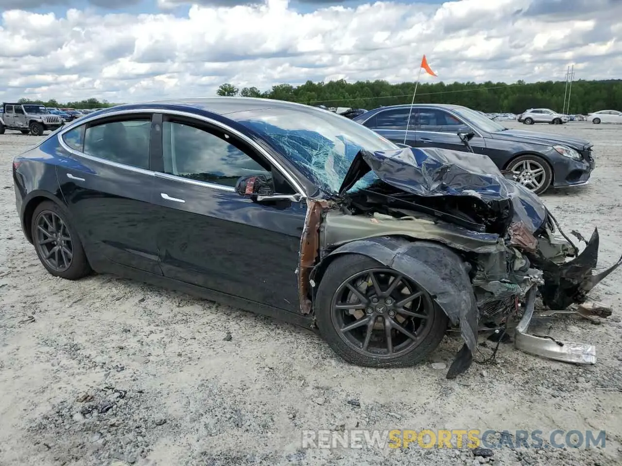 4 Photograph of a damaged car 5YJ3E1EA5LF784770 TESLA MODEL 3 2020