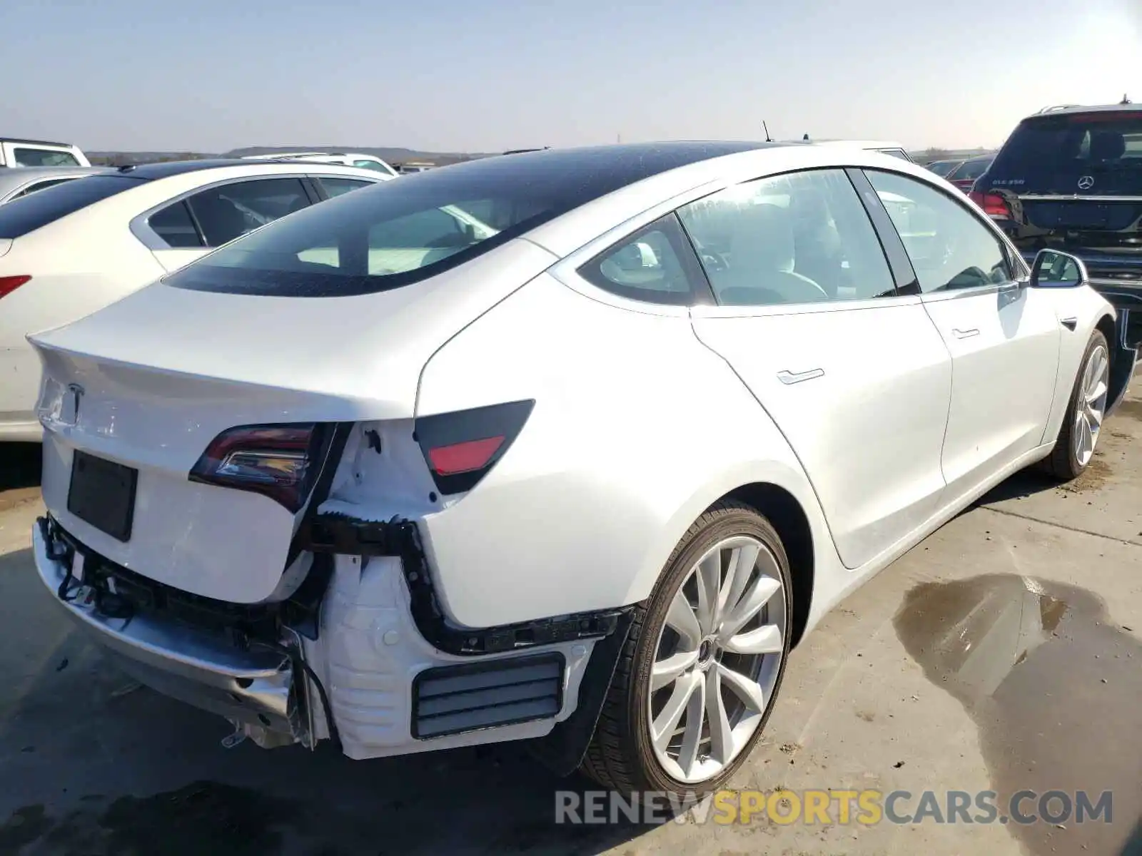 4 Photograph of a damaged car 5YJ3E1EA5LF786017 TESLA MODEL 3 2020