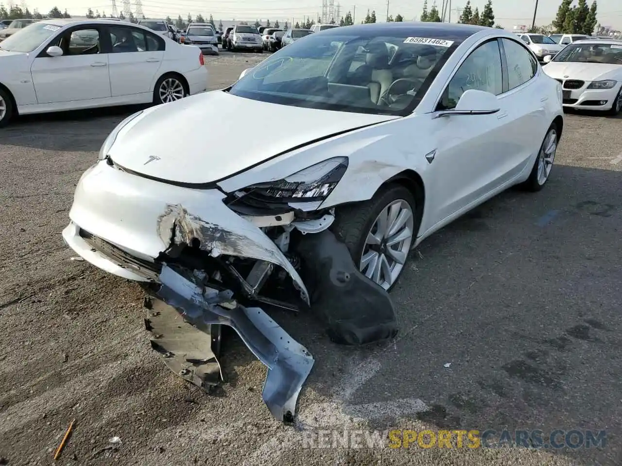 2 Photograph of a damaged car 5YJ3E1EA5LF806413 TESLA MODEL 3 2020