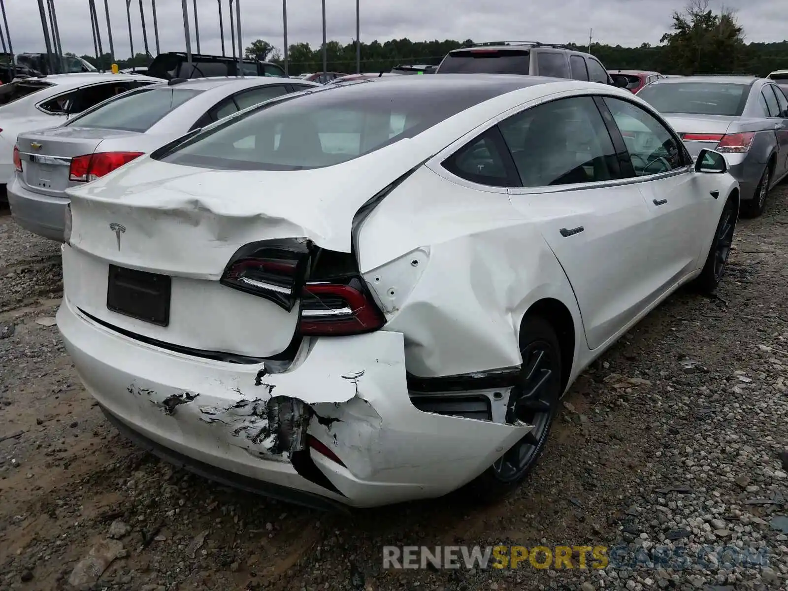 4 Photograph of a damaged car 5YJ3E1EA6LF504189 TESLA MODEL 3 2020