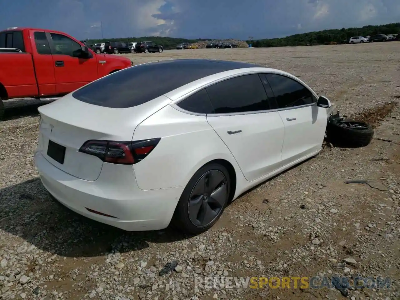 4 Photograph of a damaged car 5YJ3E1EA6LF598137 TESLA MODEL 3 2020