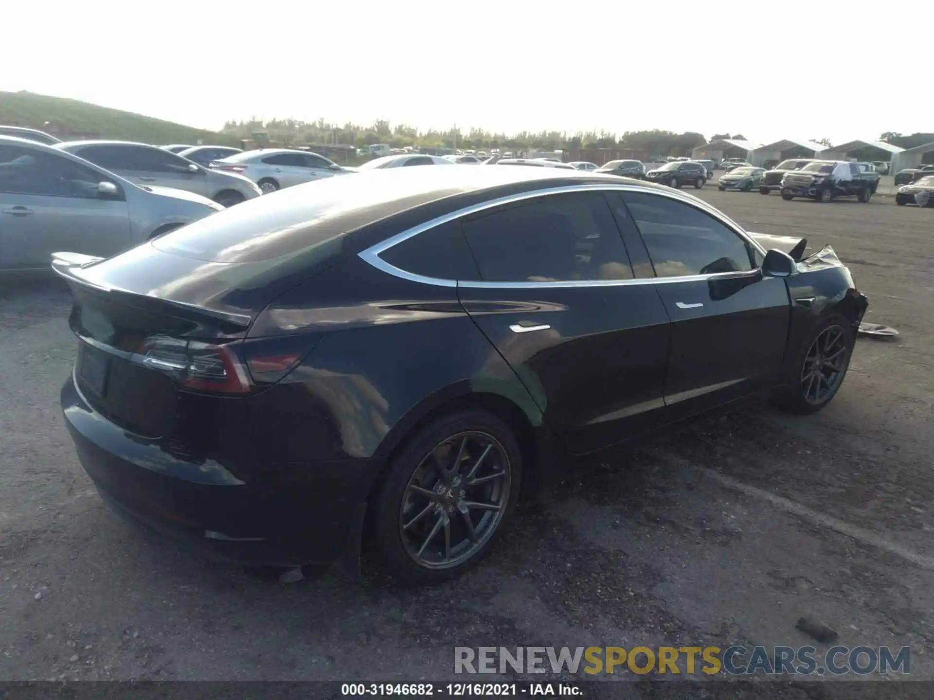 4 Photograph of a damaged car 5YJ3E1EA6LF606754 TESLA MODEL 3 2020