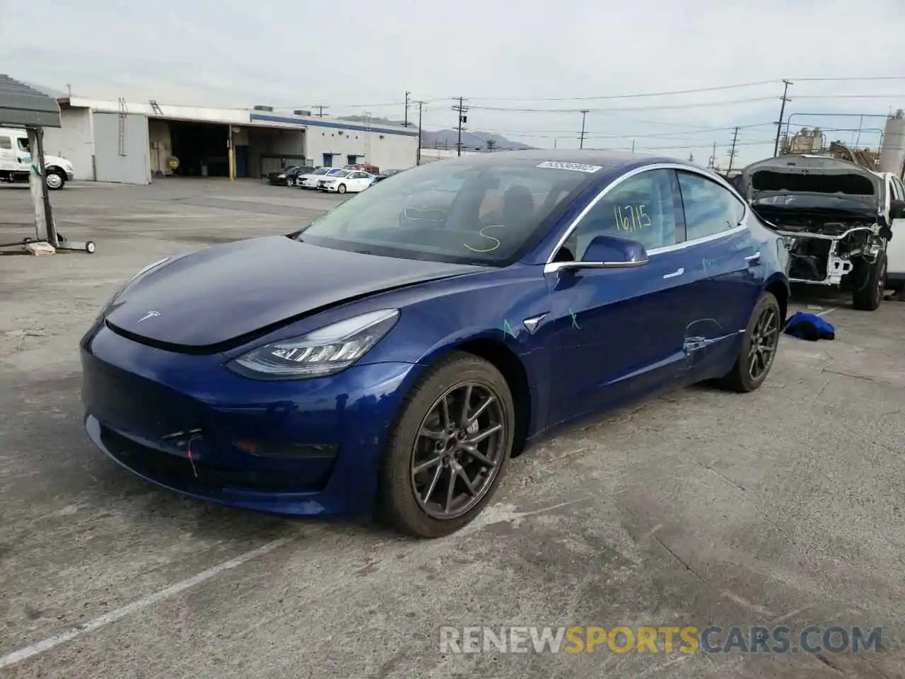 2 Photograph of a damaged car 5YJ3E1EA6LF611985 TESLA MODEL 3 2020