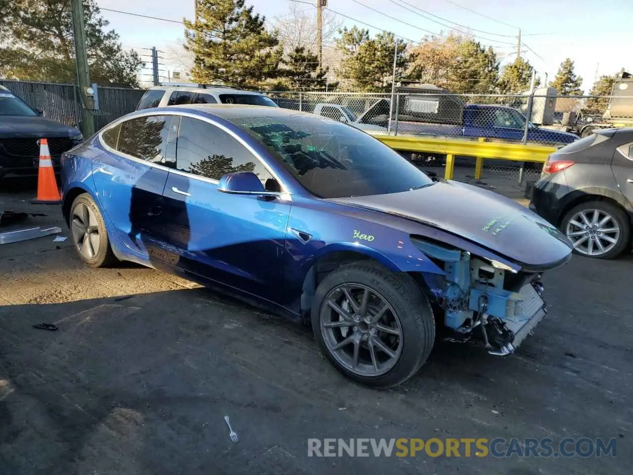 4 Photograph of a damaged car 5YJ3E1EA6LF615079 TESLA MODEL 3 2020