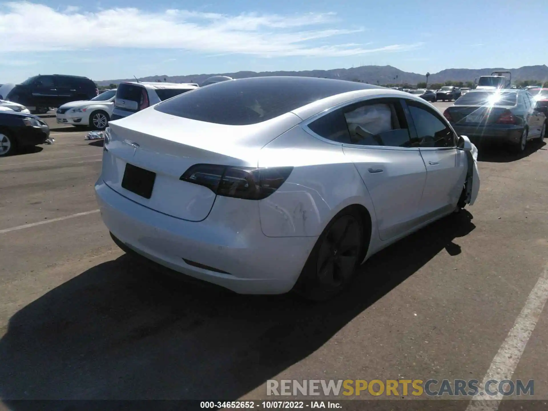 4 Photograph of a damaged car 5YJ3E1EA6LF631413 TESLA MODEL 3 2020