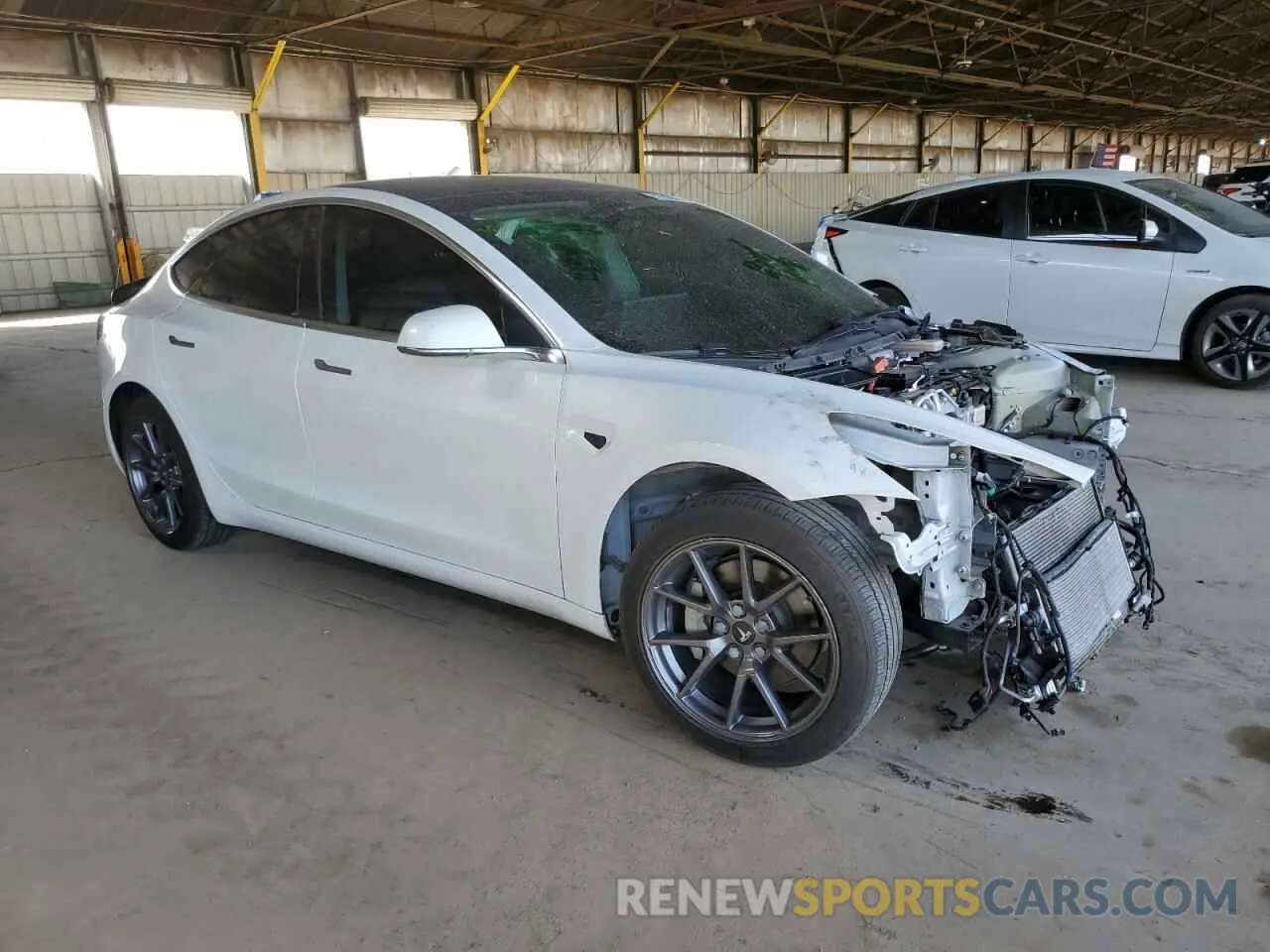 4 Photograph of a damaged car 5YJ3E1EA6LF645215 TESLA MODEL 3 2020