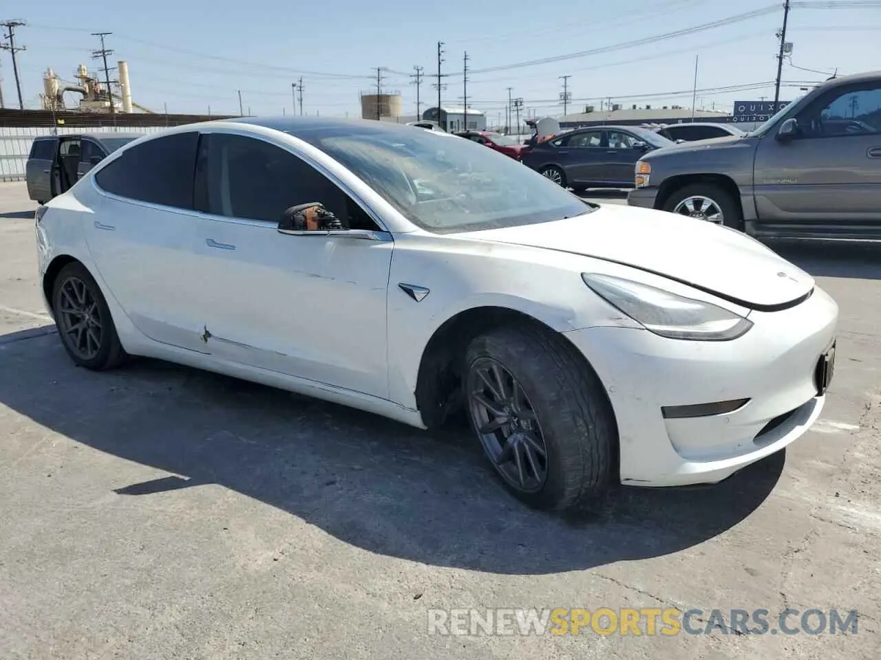 4 Photograph of a damaged car 5YJ3E1EA6LF659759 TESLA MODEL 3 2020