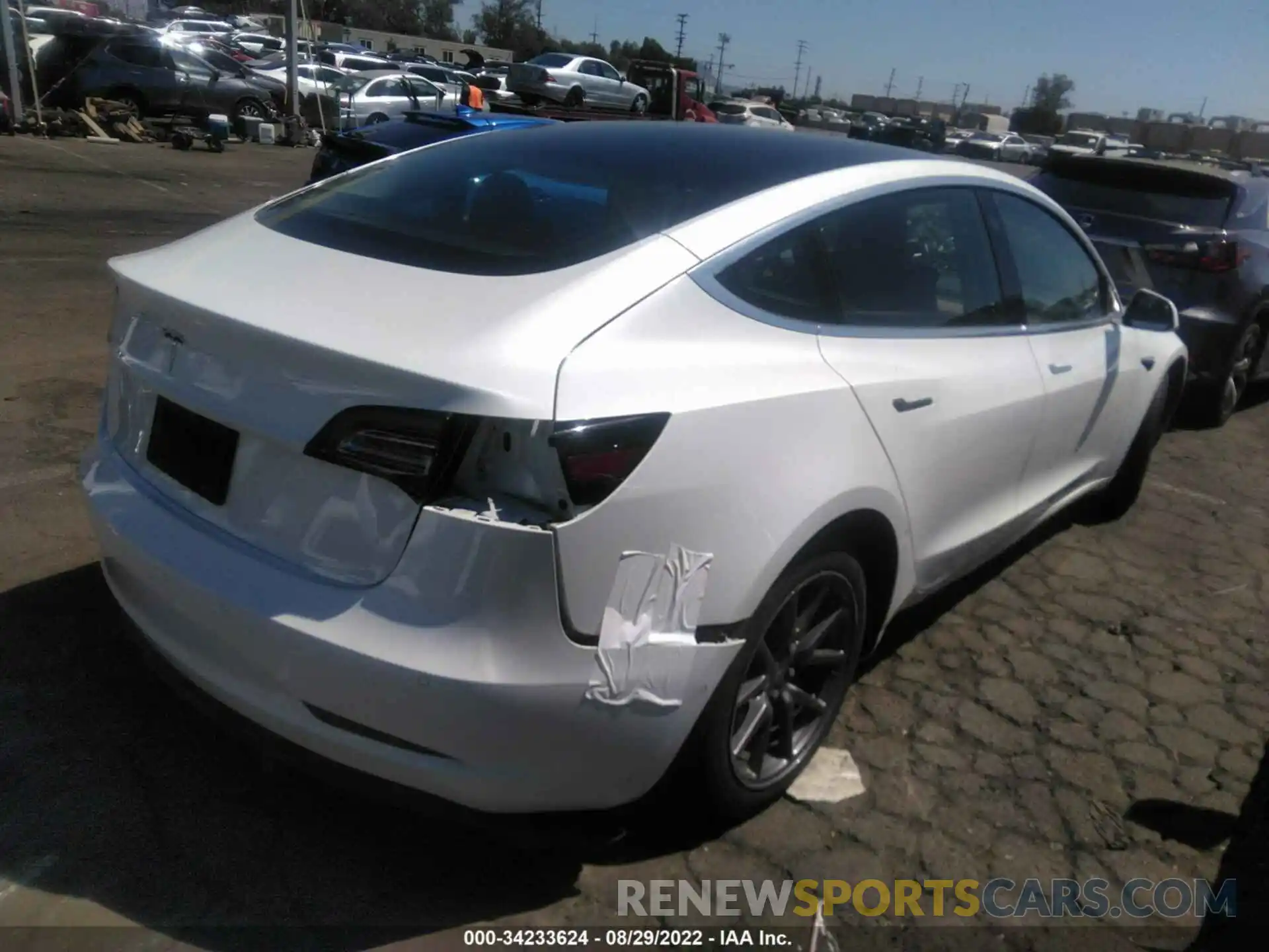 4 Photograph of a damaged car 5YJ3E1EA6LF659809 TESLA MODEL 3 2020