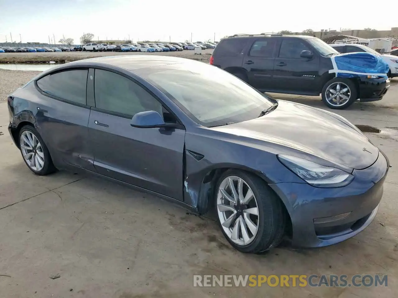 4 Photograph of a damaged car 5YJ3E1EA6LF662676 TESLA MODEL 3 2020