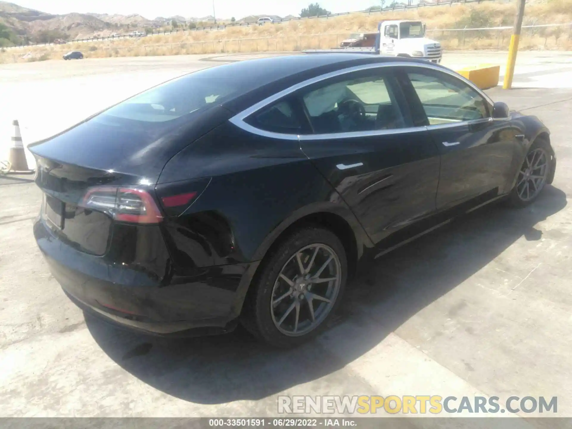 4 Photograph of a damaged car 5YJ3E1EA6LF704442 TESLA MODEL 3 2020