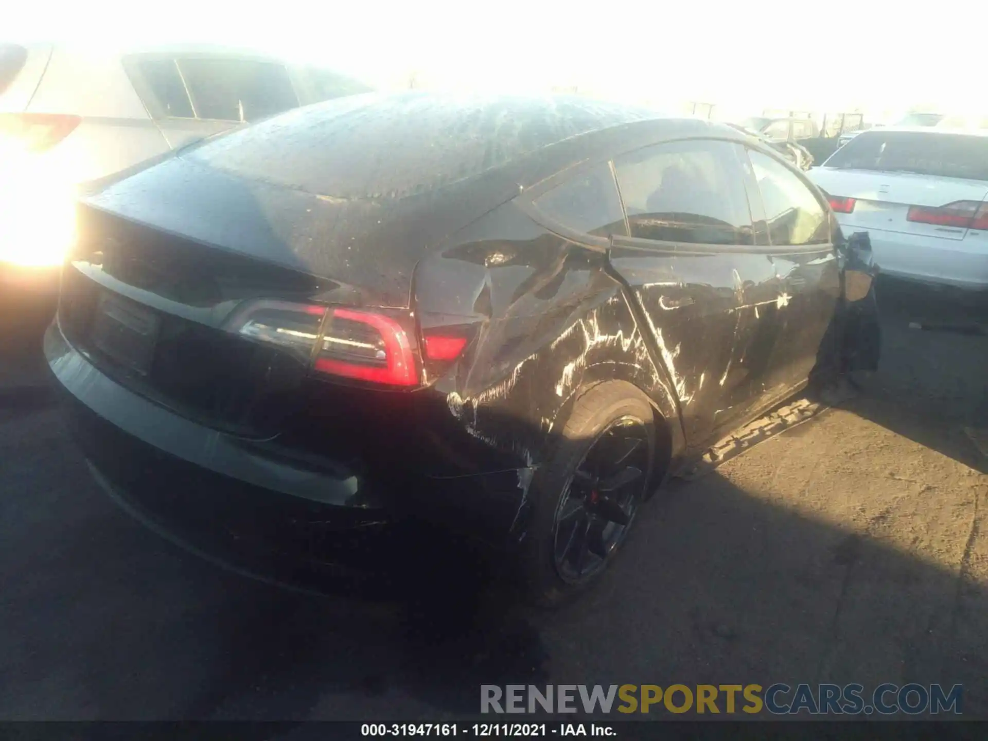 4 Photograph of a damaged car 5YJ3E1EA6LF704649 TESLA MODEL 3 2020