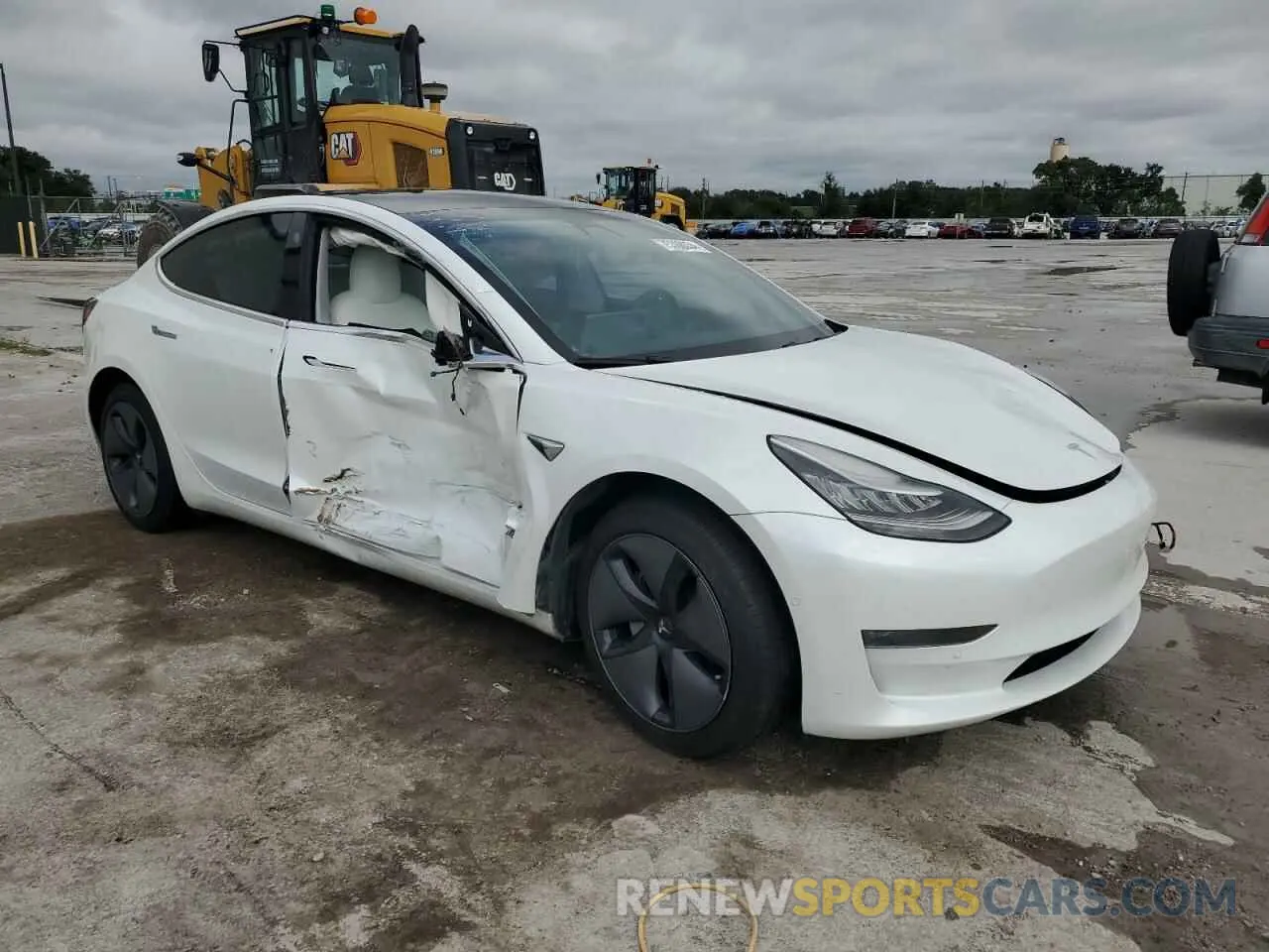 4 Photograph of a damaged car 5YJ3E1EA6LF709947 TESLA MODEL 3 2020