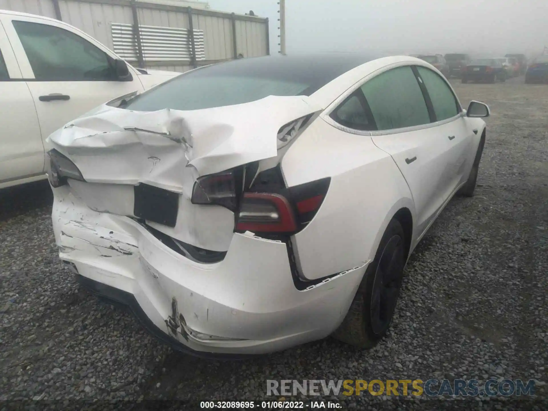 4 Photograph of a damaged car 5YJ3E1EA6LF738204 TESLA MODEL 3 2020