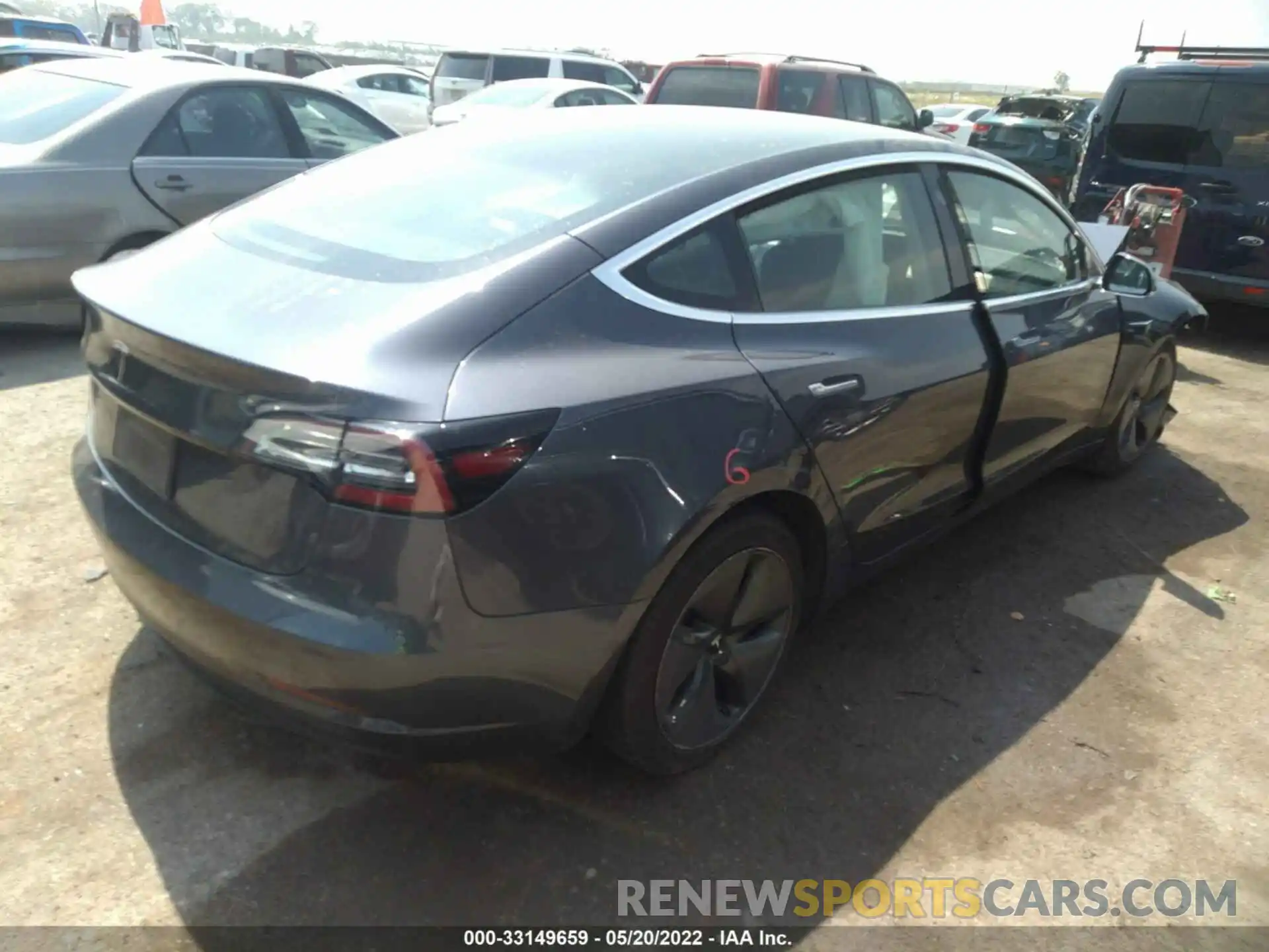 4 Photograph of a damaged car 5YJ3E1EA6LF739336 TESLA MODEL 3 2020