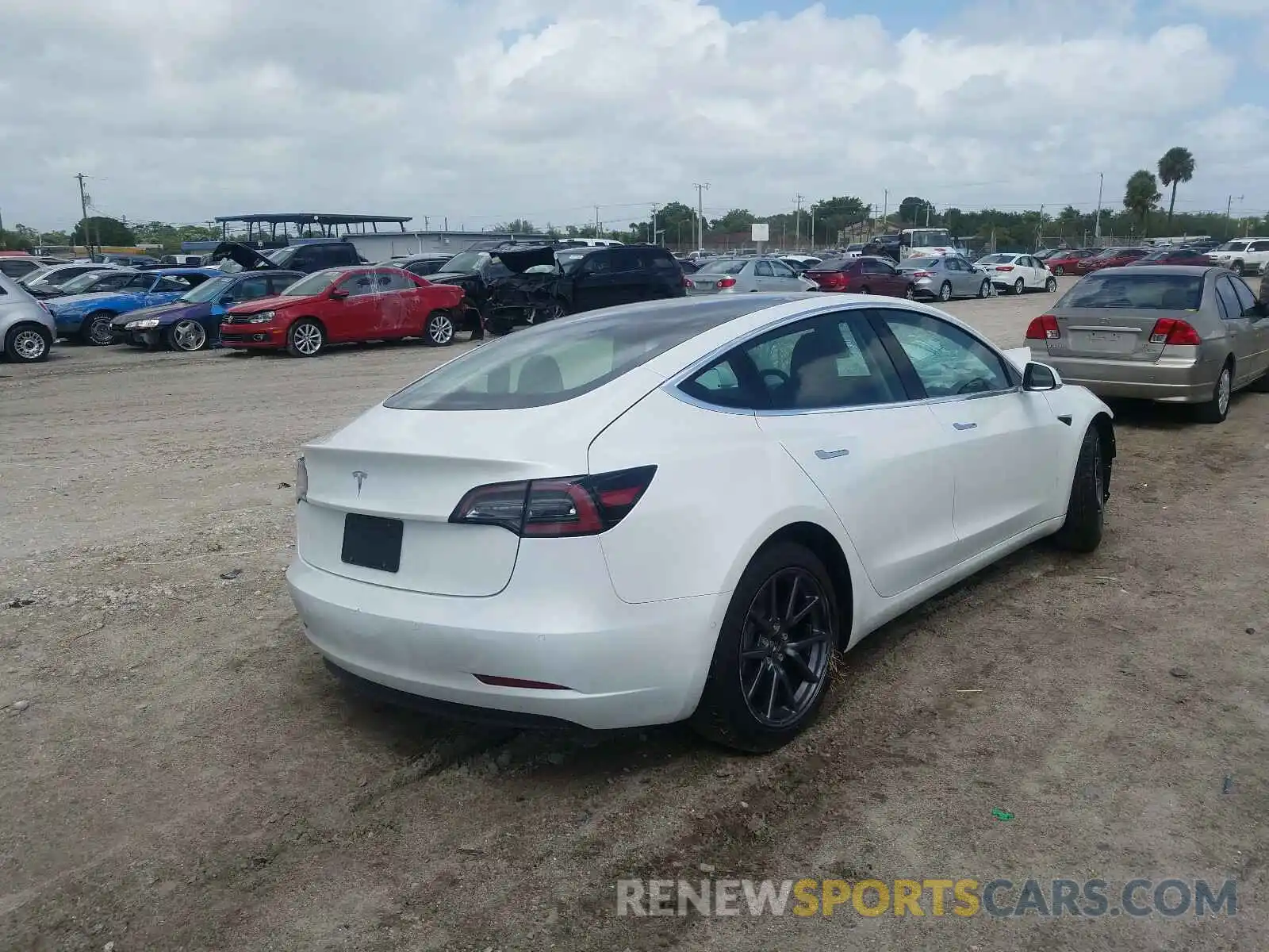 4 Photograph of a damaged car 5YJ3E1EA6LF740549 TESLA MODEL 3 2020