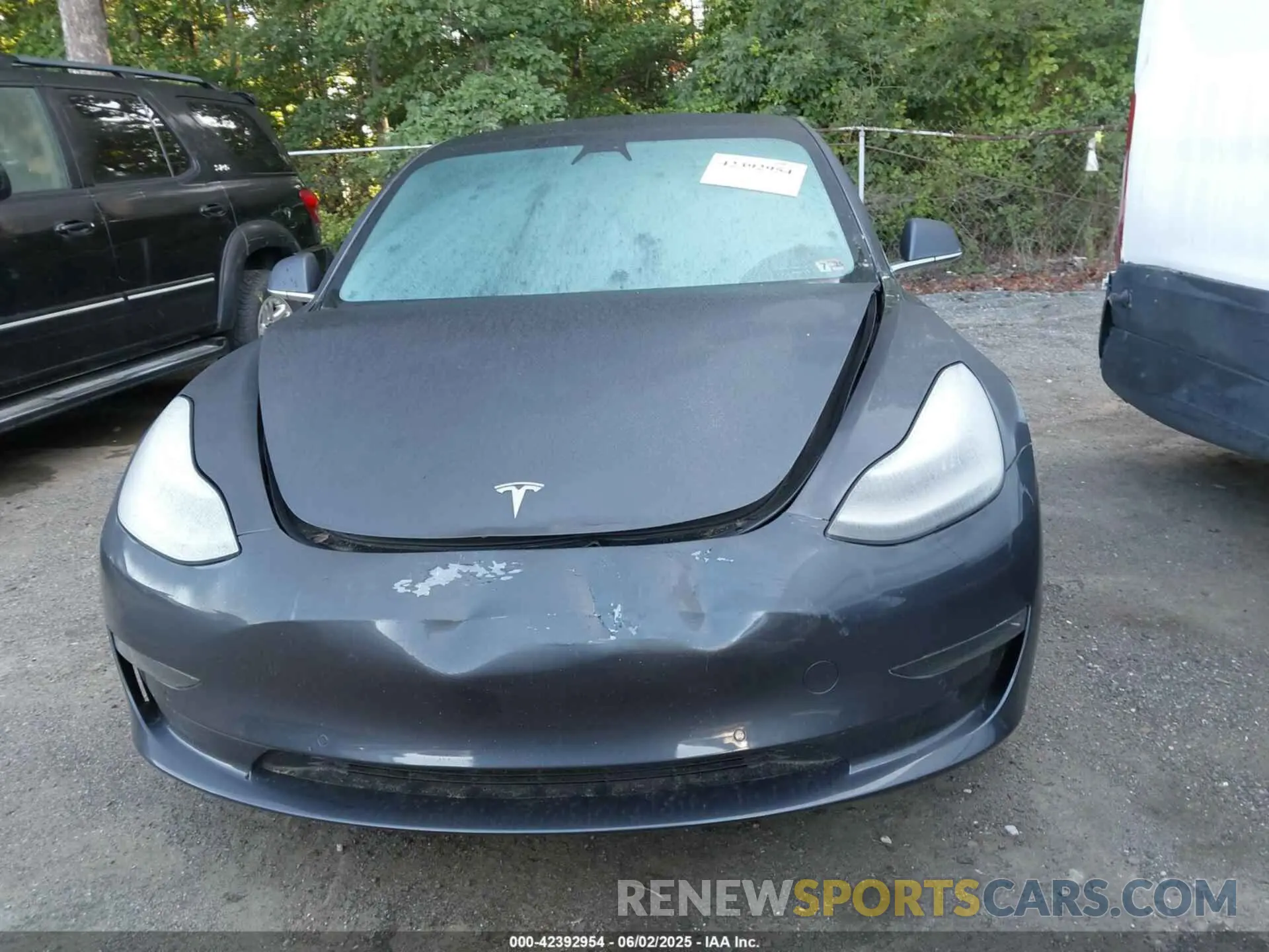 12 Photograph of a damaged car 5YJ3E1EA6LF740728 TESLA MODEL 3 2020