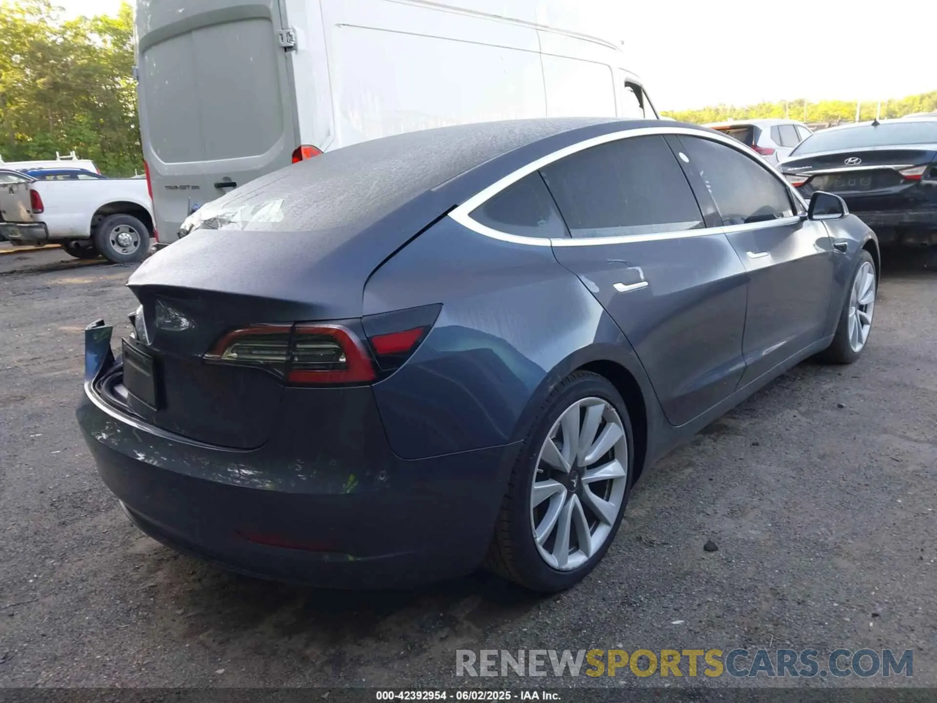 4 Photograph of a damaged car 5YJ3E1EA6LF740728 TESLA MODEL 3 2020
