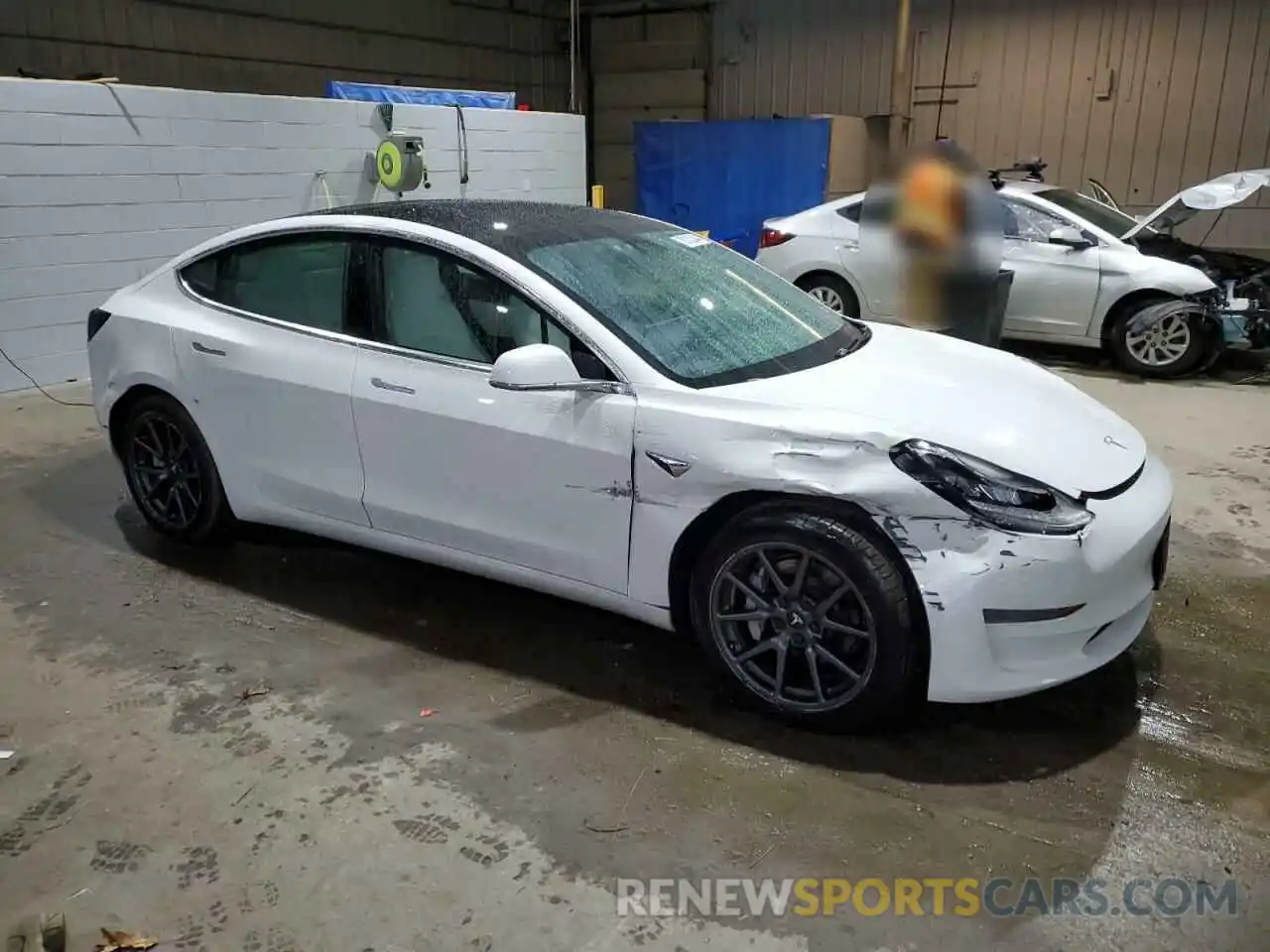 4 Photograph of a damaged car 5YJ3E1EA6LF740969 TESLA MODEL 3 2020