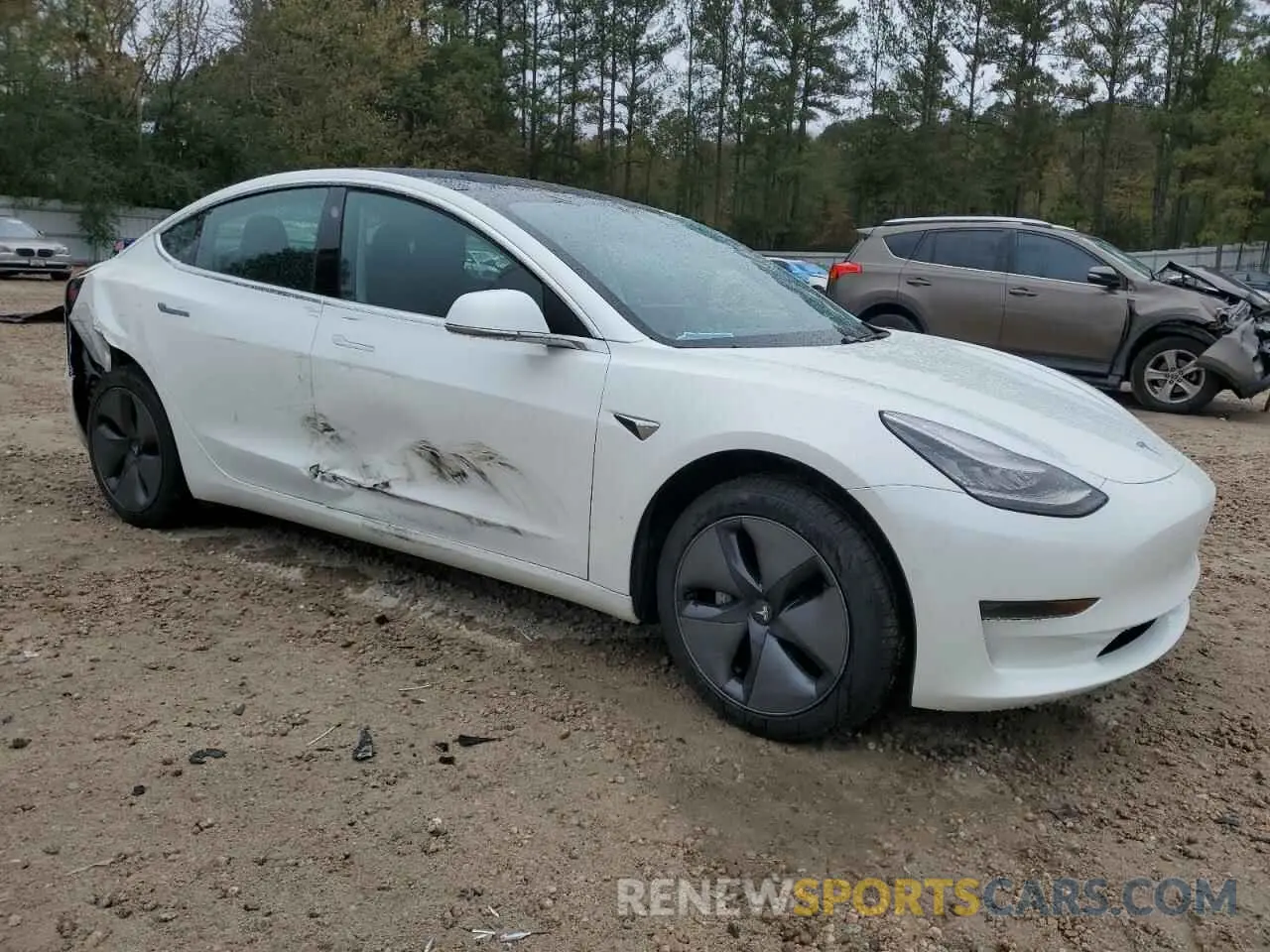 4 Photograph of a damaged car 5YJ3E1EA7LF504718 TESLA MODEL 3 2020