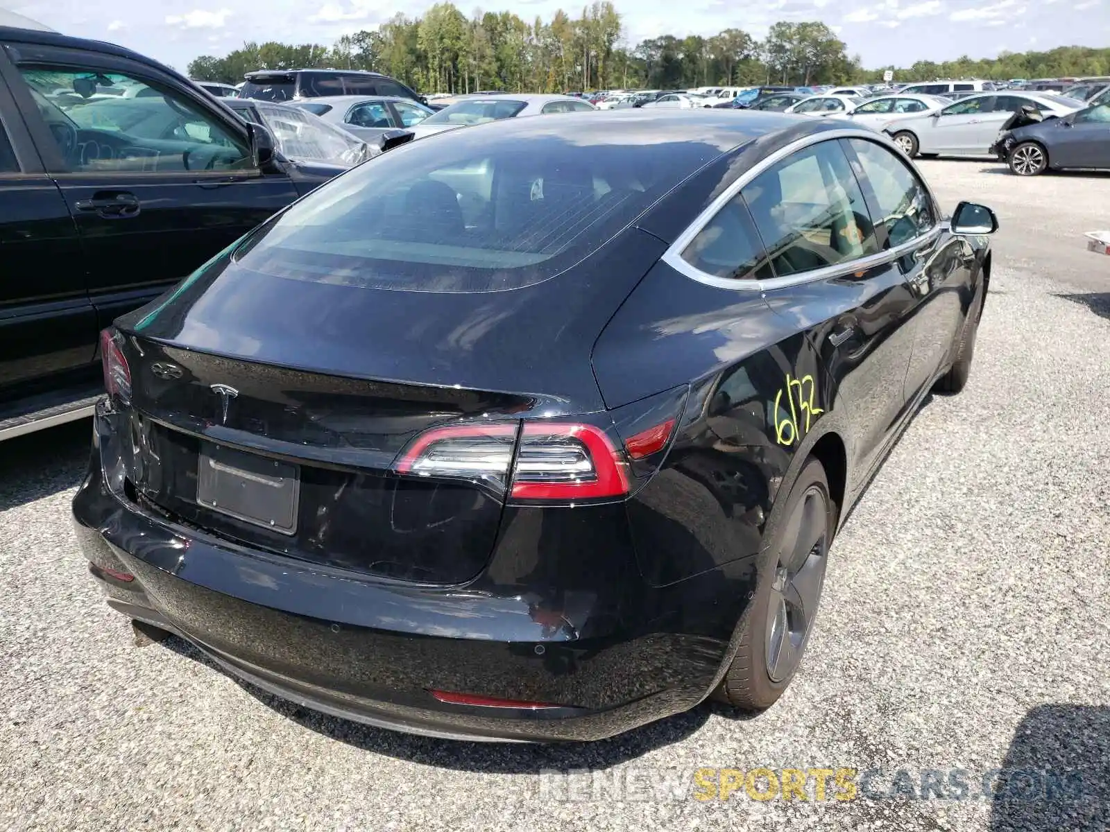 4 Photograph of a damaged car 5YJ3E1EA7LF611235 TESLA MODEL 3 2020