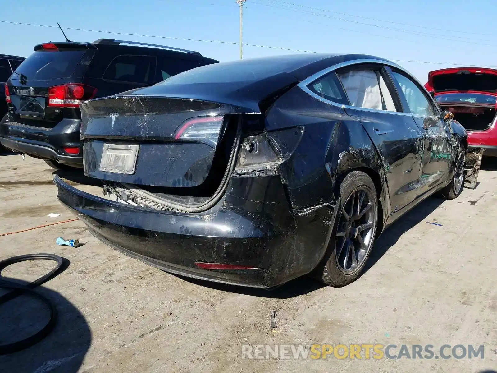 4 Photograph of a damaged car 5YJ3E1EA7LF611302 TESLA MODEL 3 2020