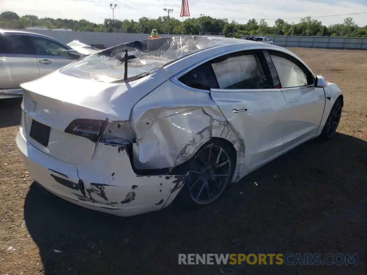 4 Photograph of a damaged car 5YJ3E1EA7LF660127 TESLA MODEL 3 2020