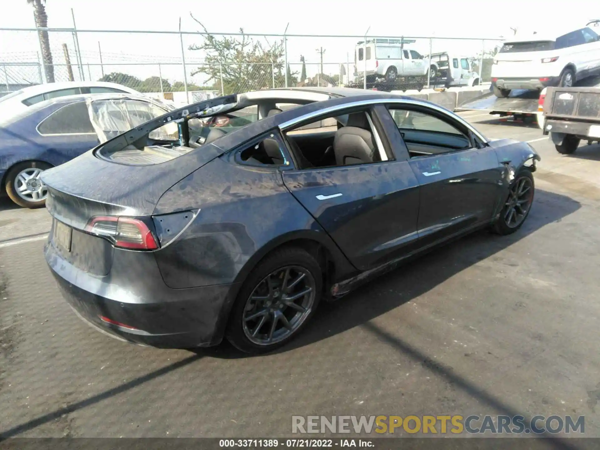 4 Photograph of a damaged car 5YJ3E1EA7LF703199 TESLA MODEL 3 2020