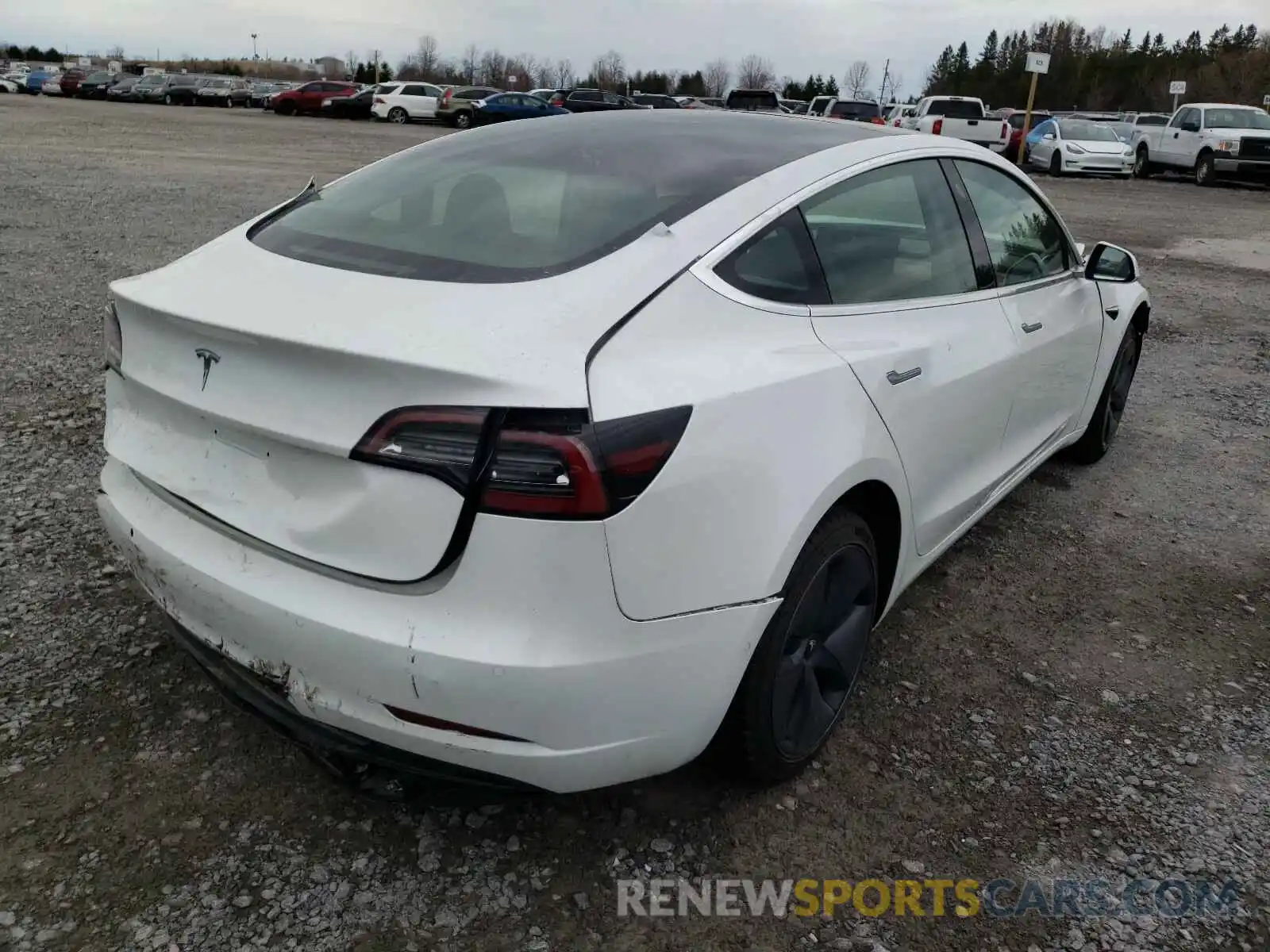 4 Photograph of a damaged car 5YJ3E1EA7LF704000 TESLA MODEL 3 2020