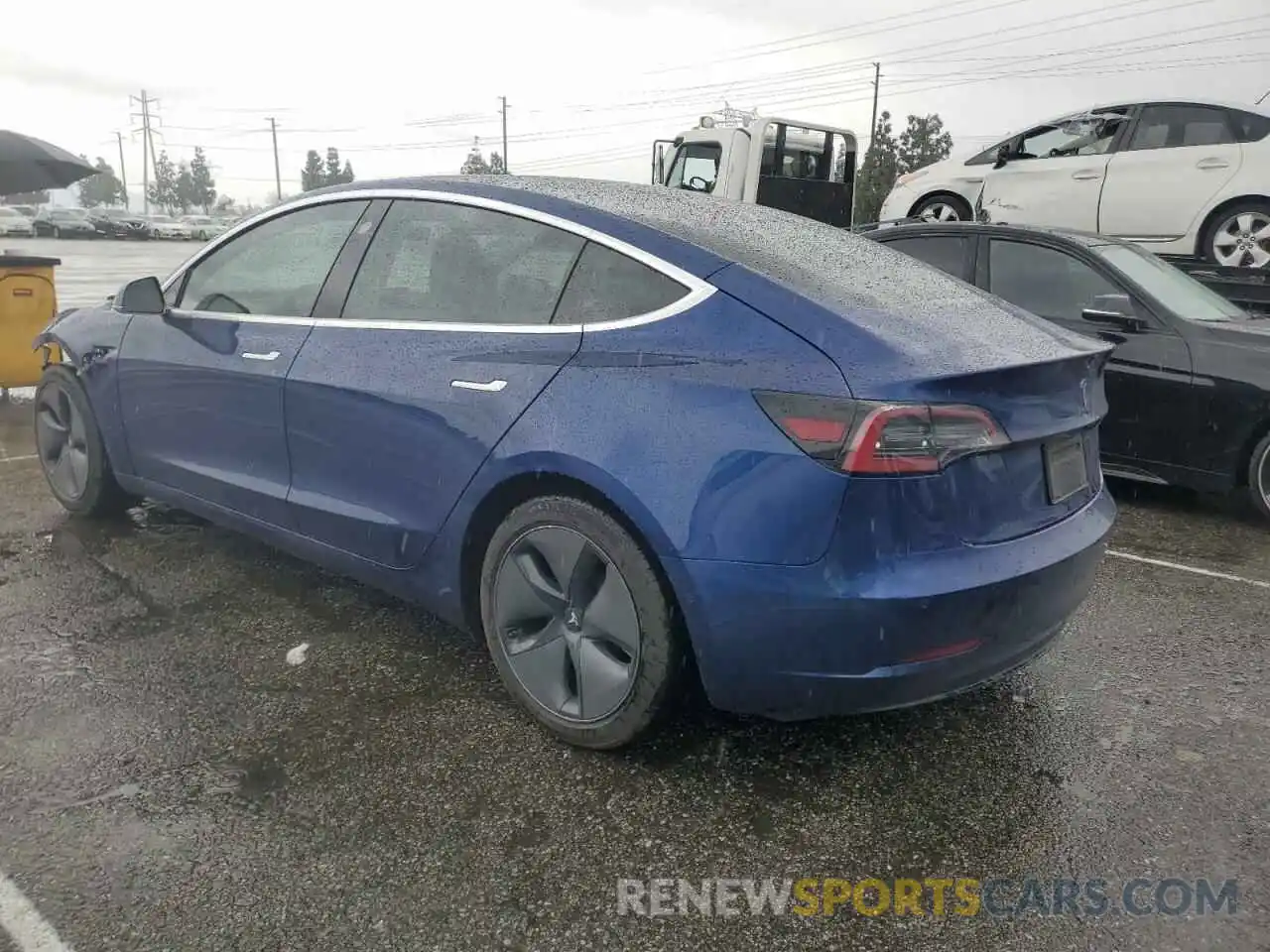 2 Photograph of a damaged car 5YJ3E1EA7LF705759 TESLA MODEL 3 2020