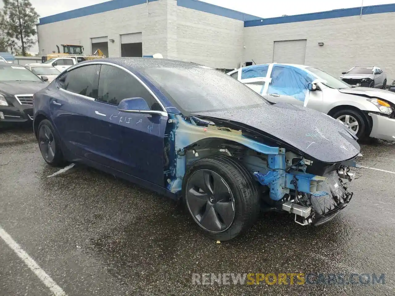 4 Photograph of a damaged car 5YJ3E1EA7LF705759 TESLA MODEL 3 2020