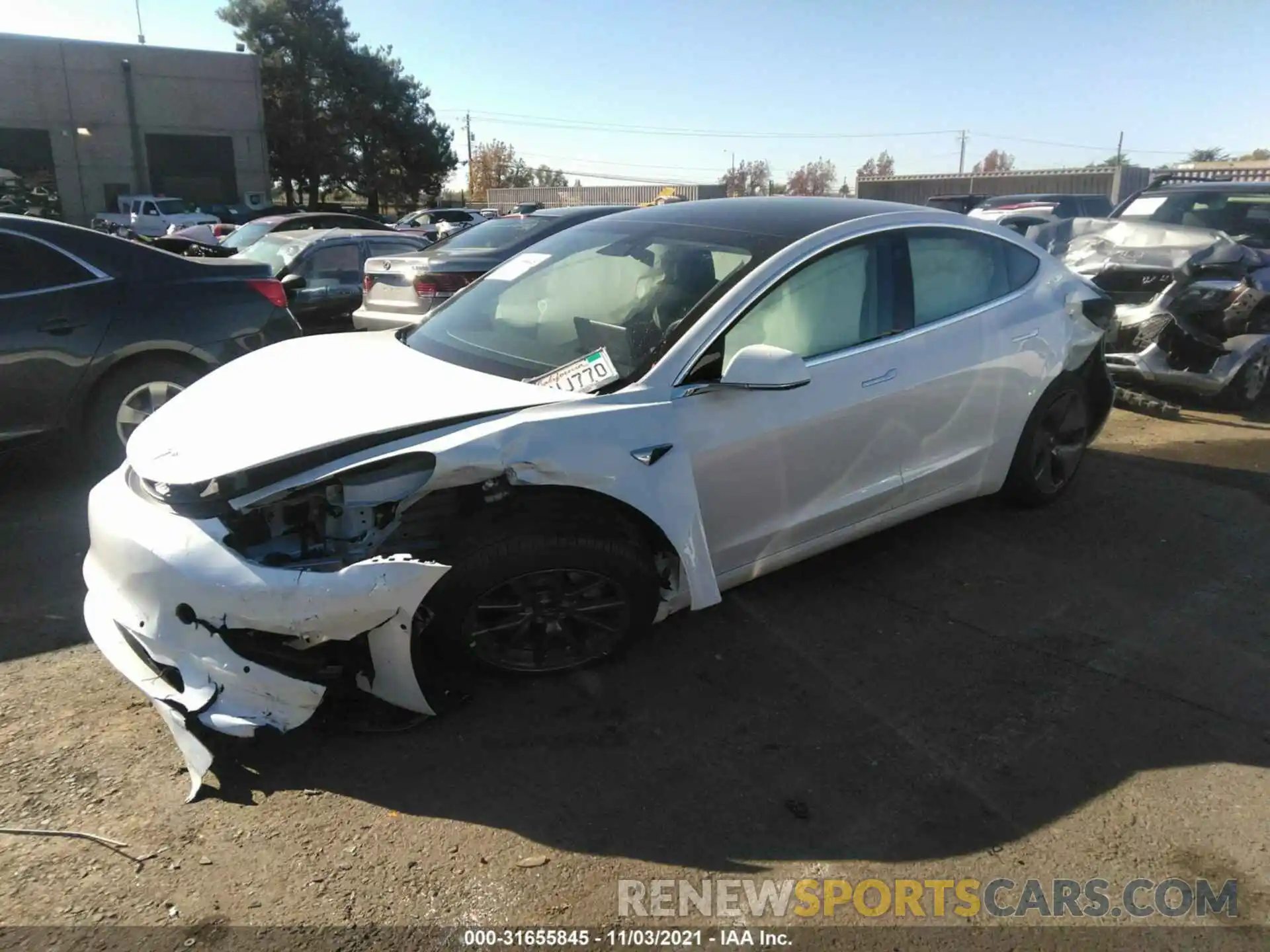 2 Photograph of a damaged car 5YJ3E1EA7LF706846 TESLA MODEL 3 2020