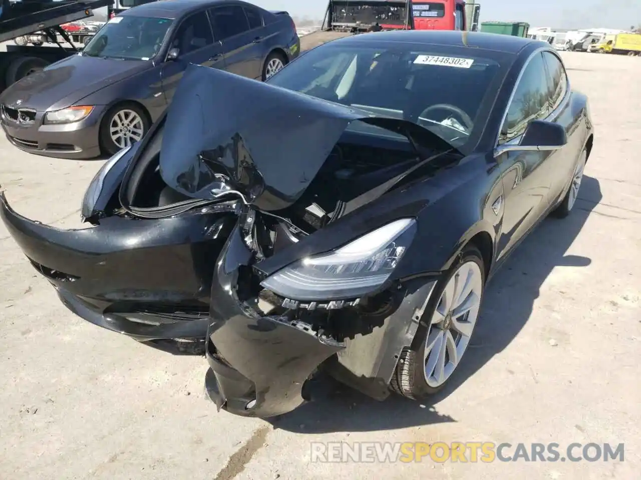 2 Photograph of a damaged car 5YJ3E1EA7LF737885 TESLA MODEL 3 2020