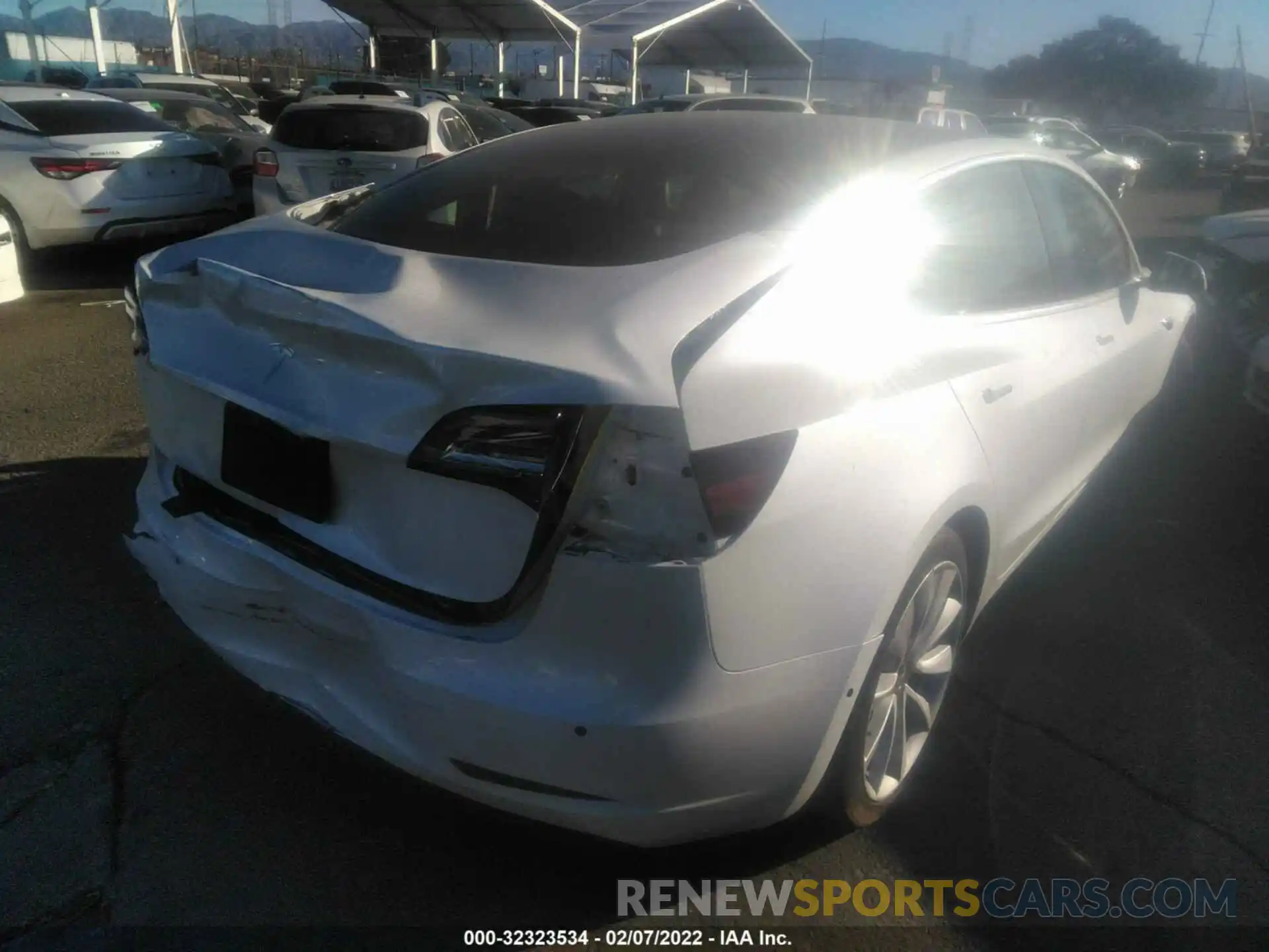 4 Photograph of a damaged car 5YJ3E1EA7LF745923 TESLA MODEL 3 2020