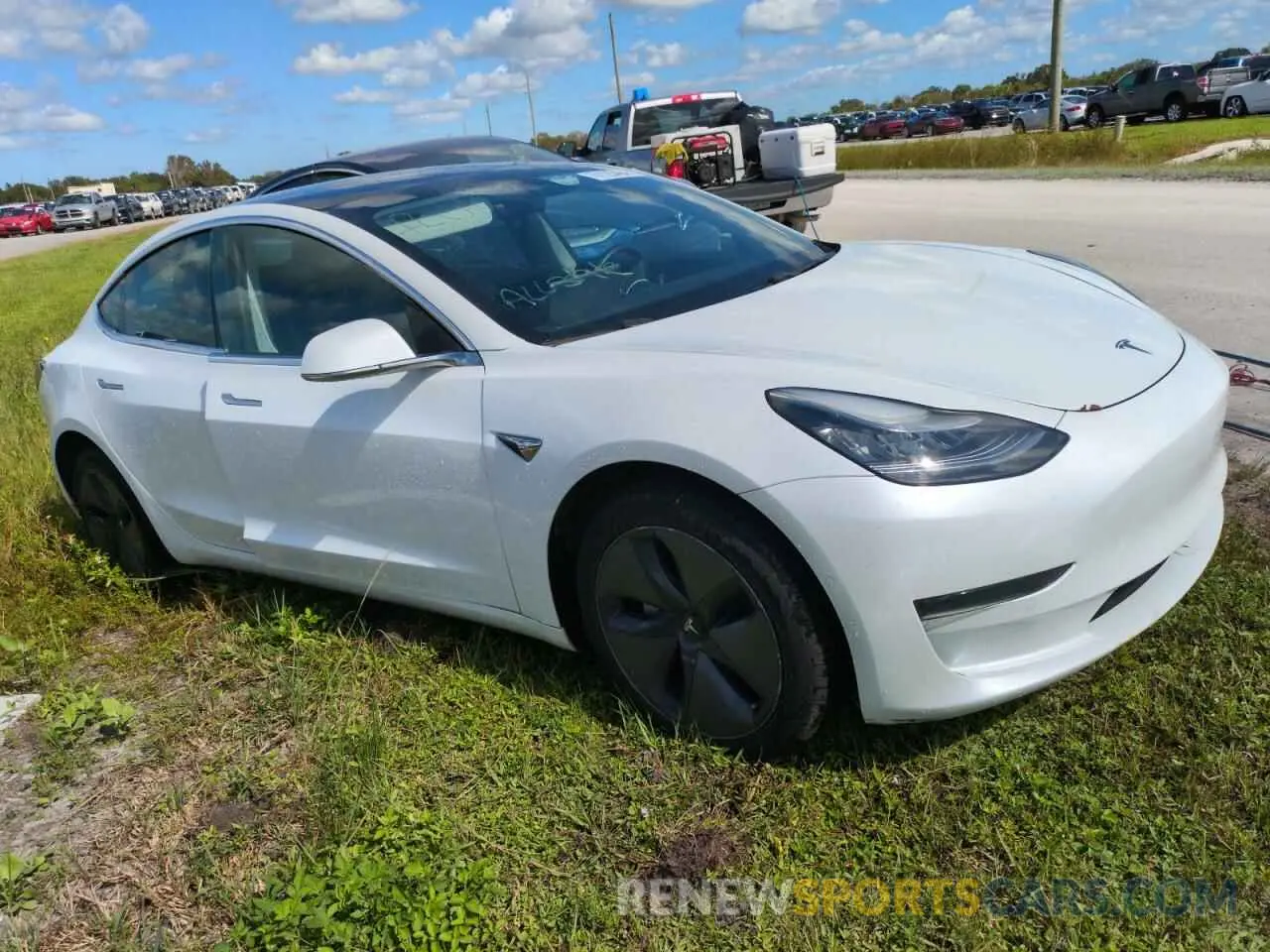 4 Photograph of a damaged car 5YJ3E1EA7LF792708 TESLA MODEL 3 2020