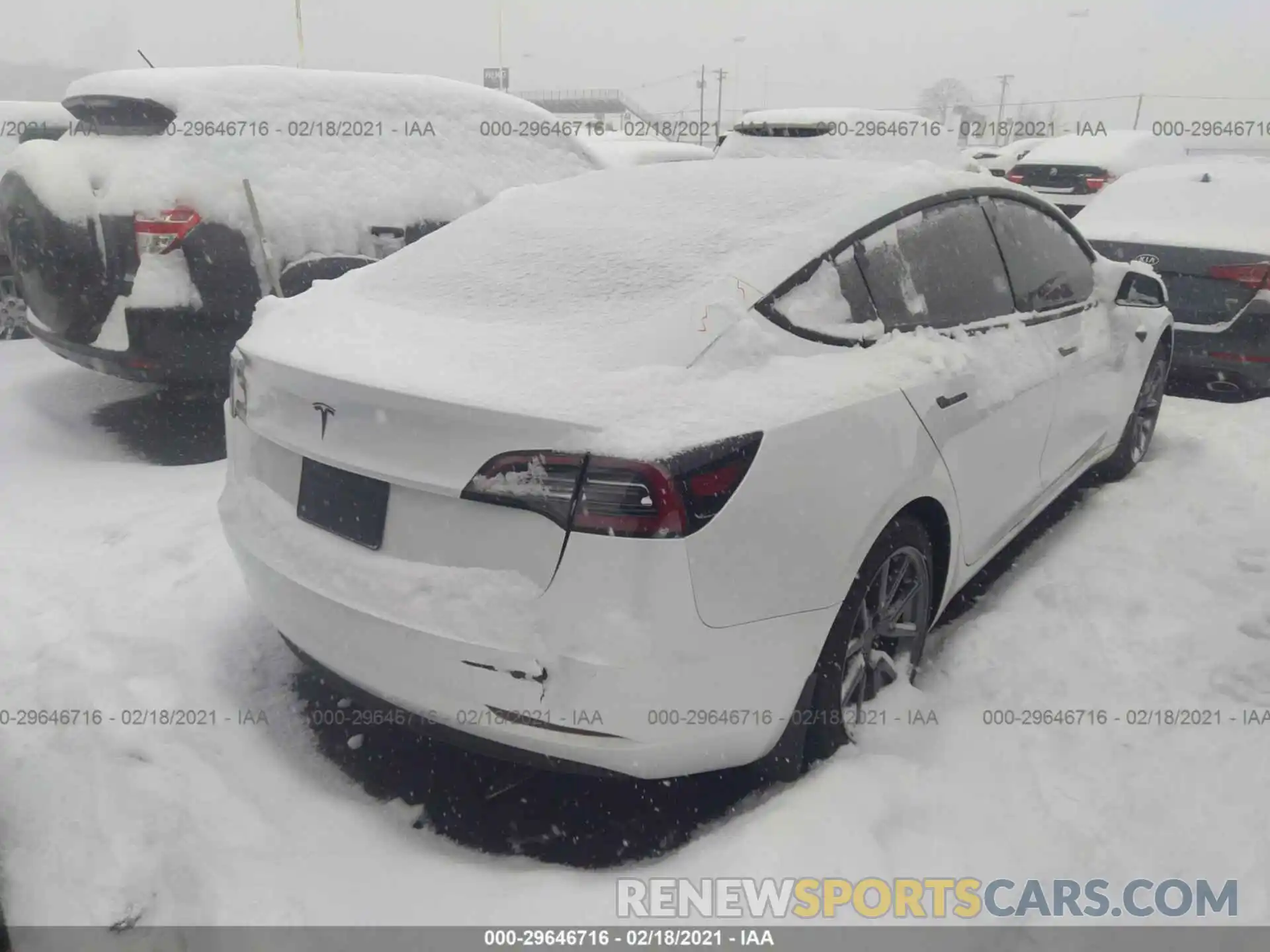 4 Photograph of a damaged car 5YJ3E1EA7LF793227 TESLA MODEL 3 2020