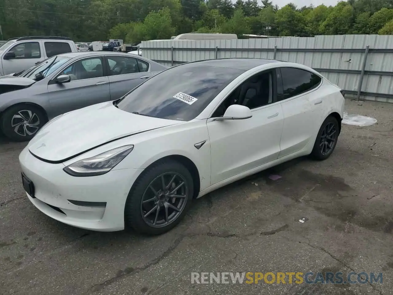 1 Photograph of a damaged car 5YJ3E1EA7LF797293 TESLA MODEL 3 2020