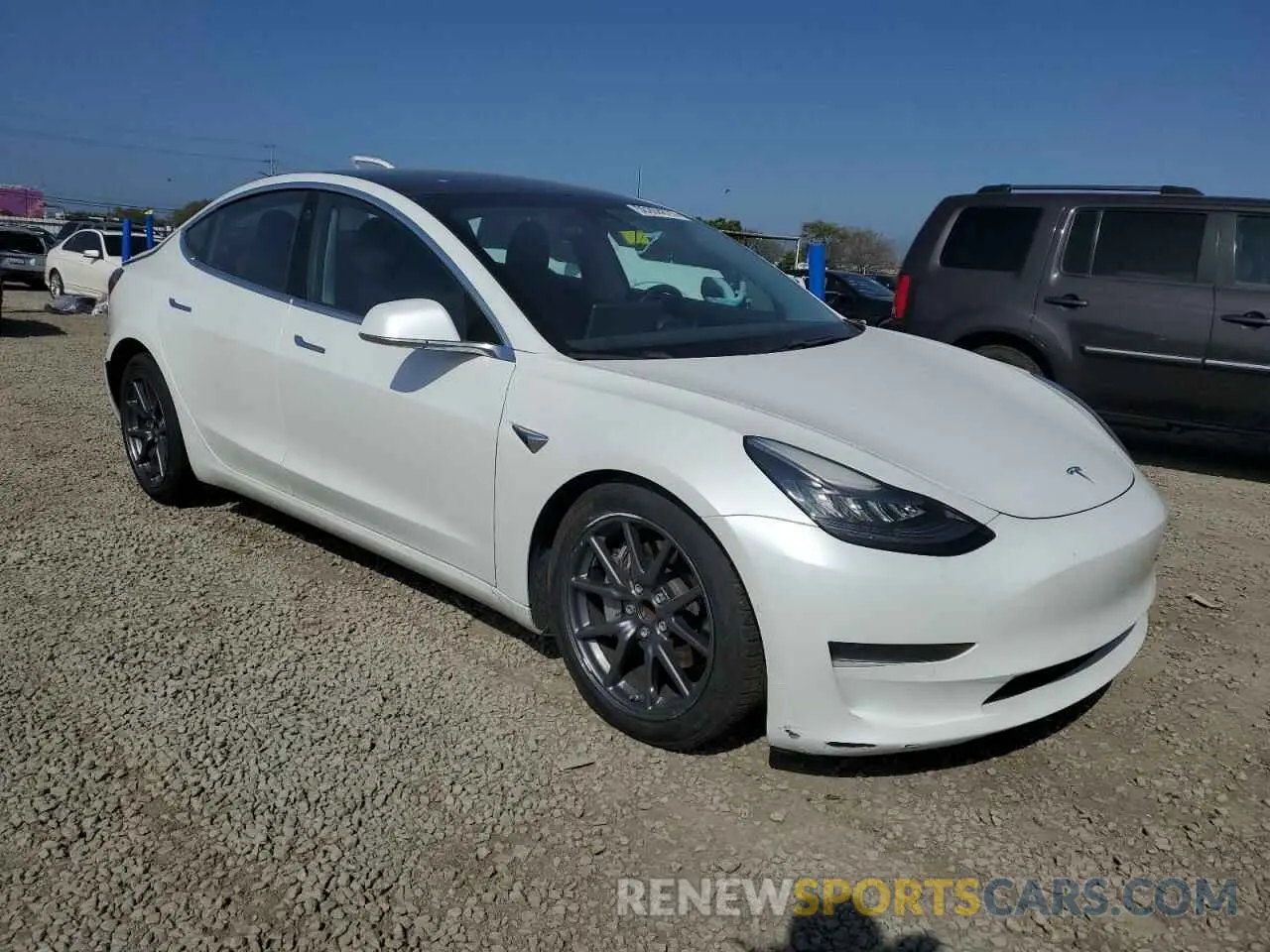 4 Photograph of a damaged car 5YJ3E1EA7LF799612 TESLA MODEL 3 2020