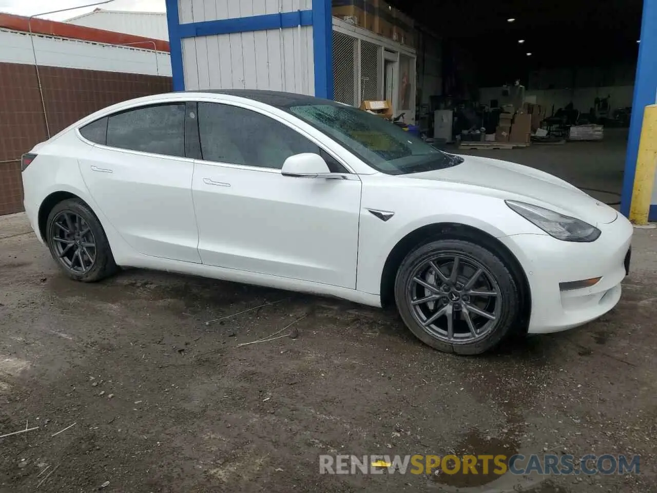 4 Photograph of a damaged car 5YJ3E1EA8LF591111 TESLA MODEL 3 2020