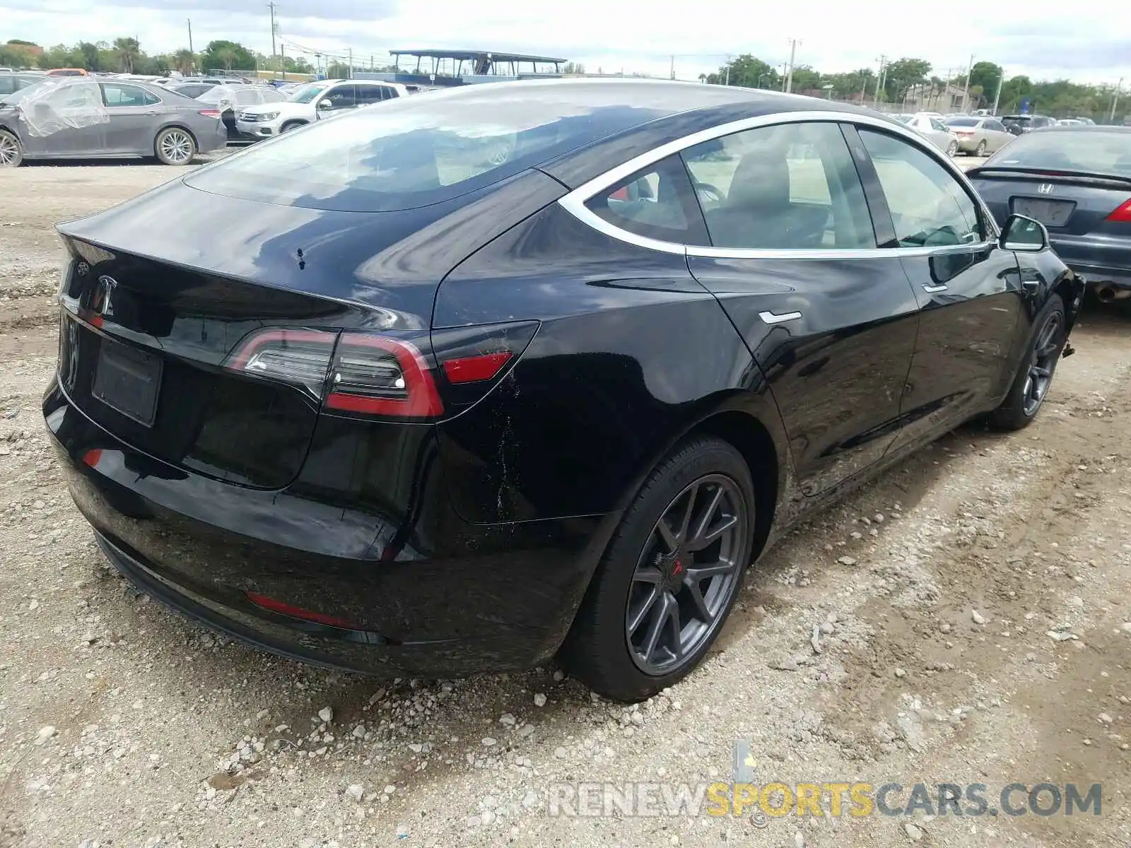 4 Photograph of a damaged car 5YJ3E1EA8LF598110 TESLA MODEL 3 2020