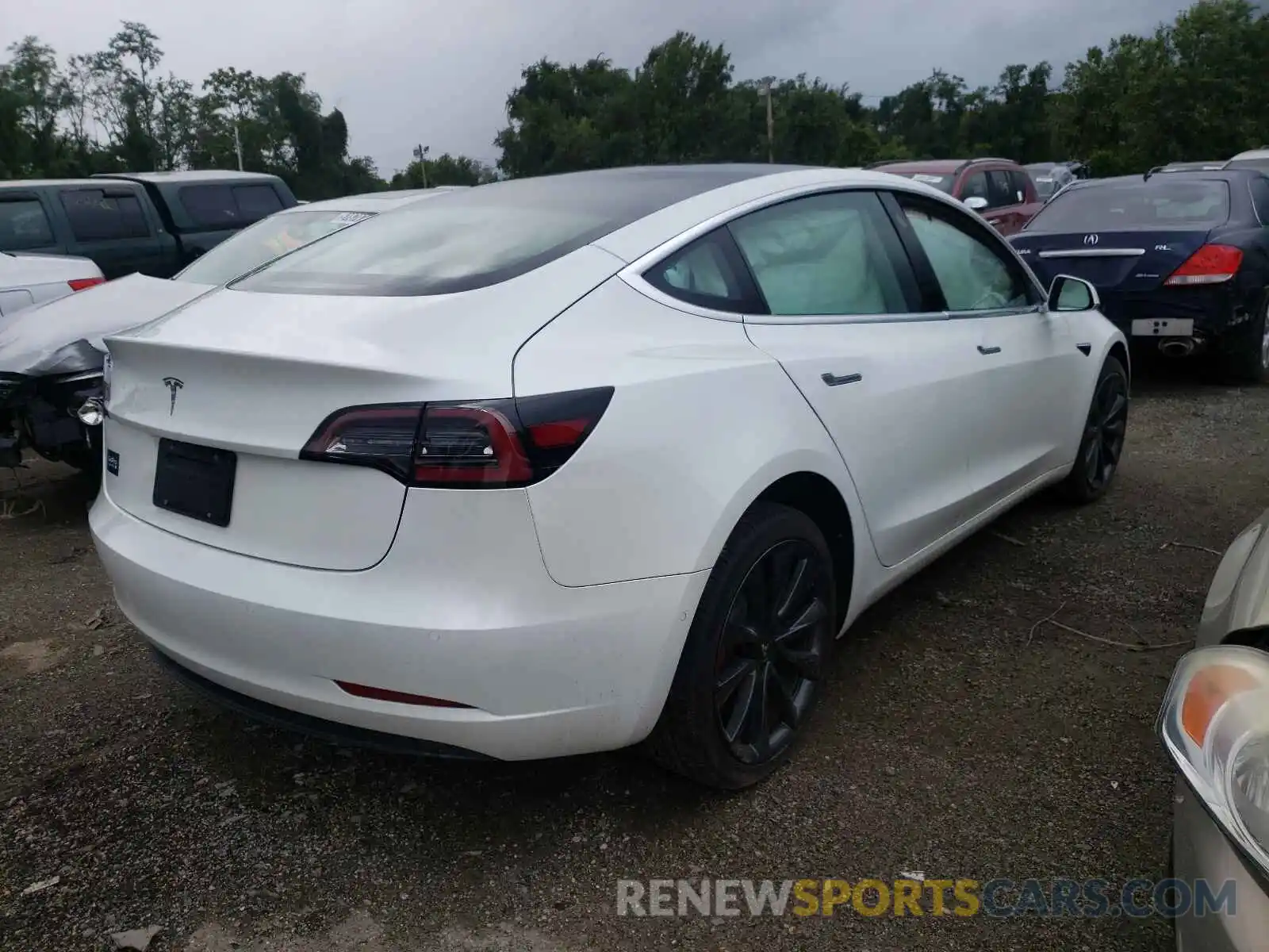 4 Photograph of a damaged car 5YJ3E1EA8LF610532 TESLA MODEL 3 2020