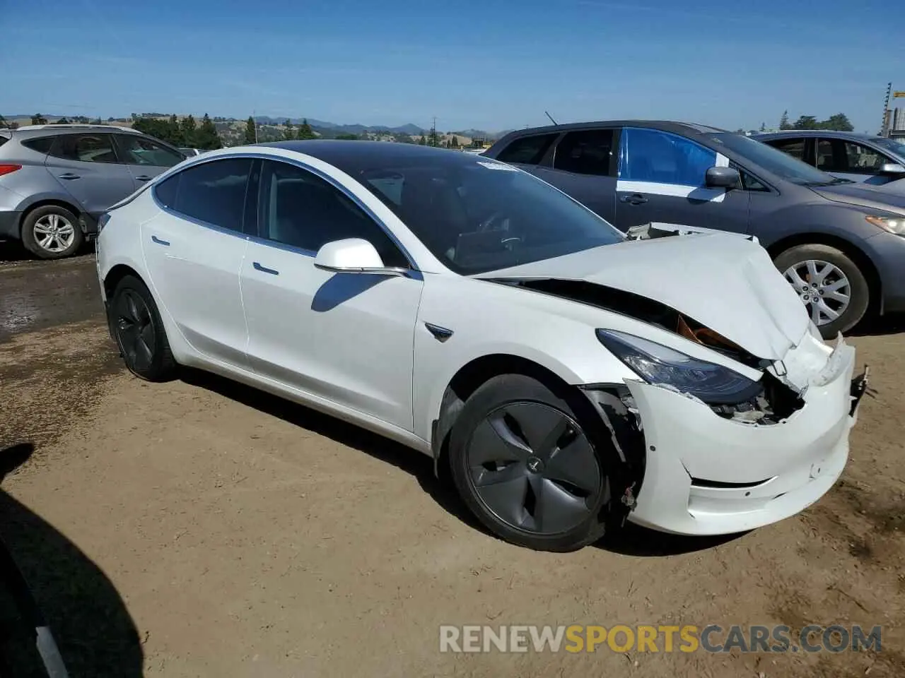 4 Photograph of a damaged car 5YJ3E1EA8LF633213 TESLA MODEL 3 2020