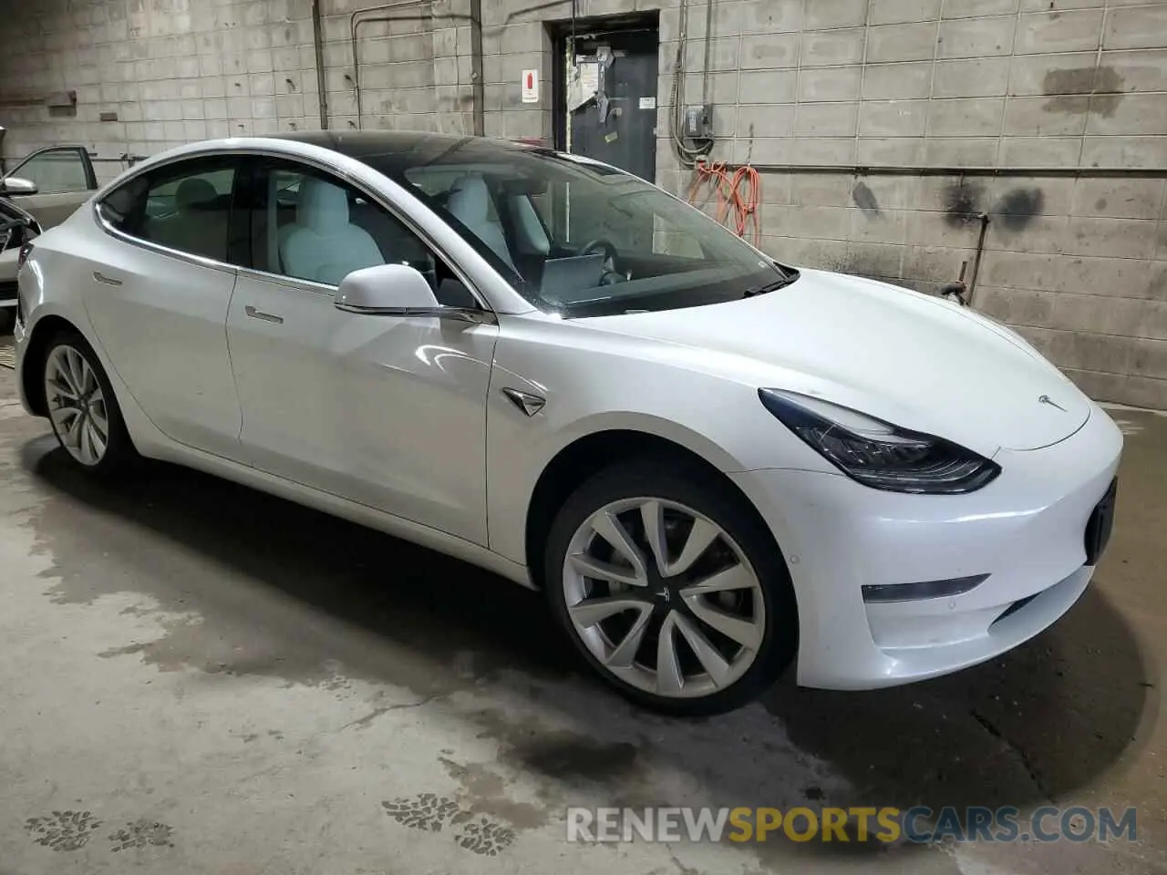 4 Photograph of a damaged car 5YJ3E1EA8LF634927 TESLA MODEL 3 2020