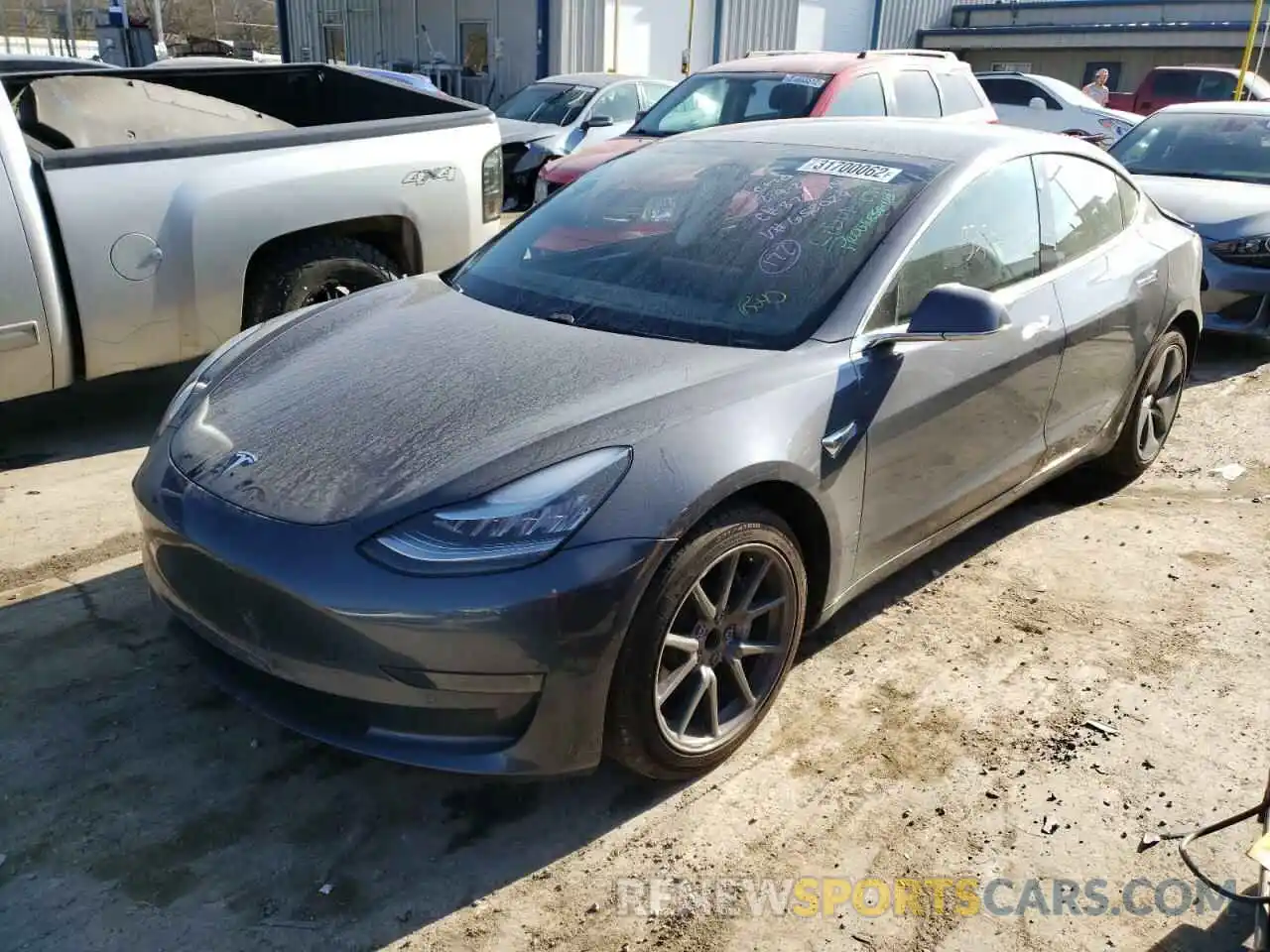 2 Photograph of a damaged car 5YJ3E1EA8LF658029 TESLA MODEL 3 2020