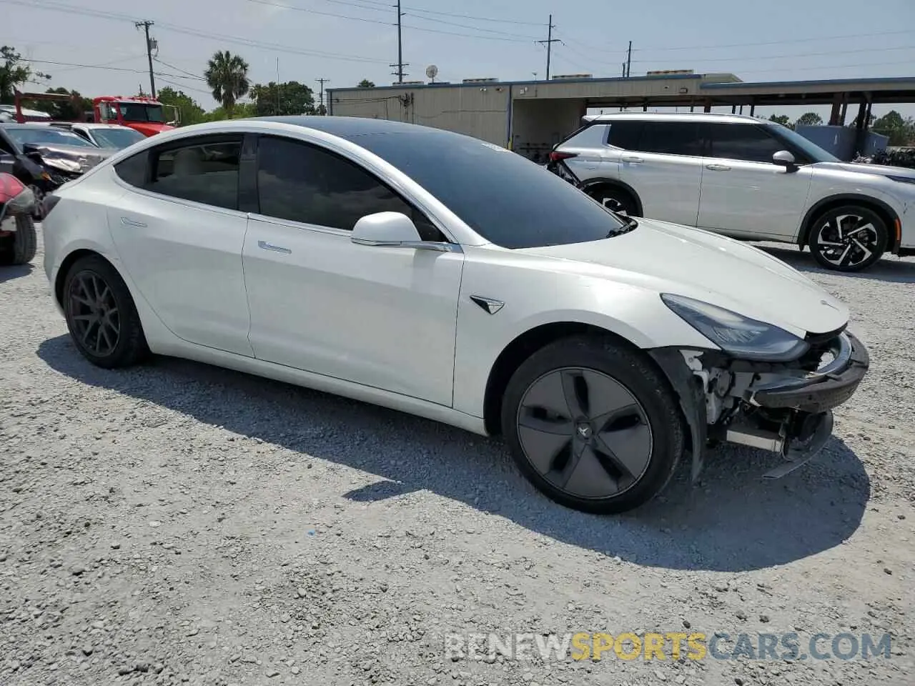 4 Photograph of a damaged car 5YJ3E1EA8LF741041 TESLA MODEL 3 2020