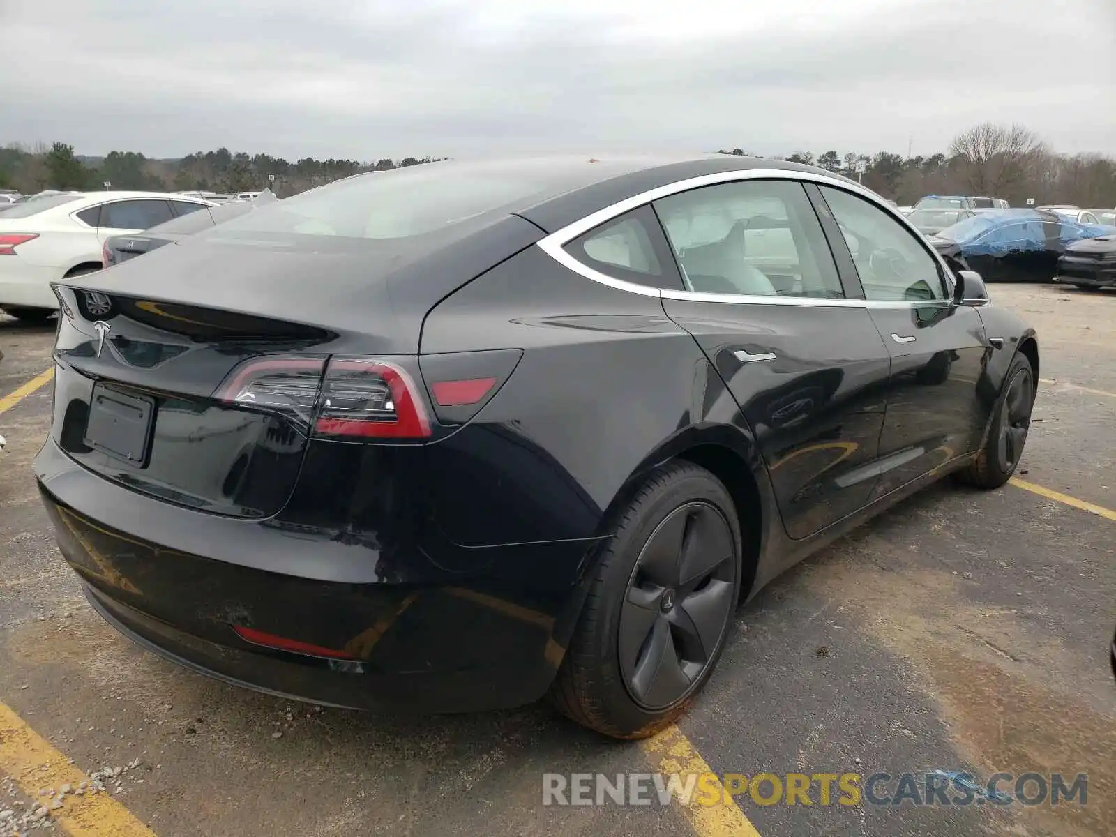 4 Photograph of a damaged car 5YJ3E1EA8LF797612 TESLA MODEL 3 2020