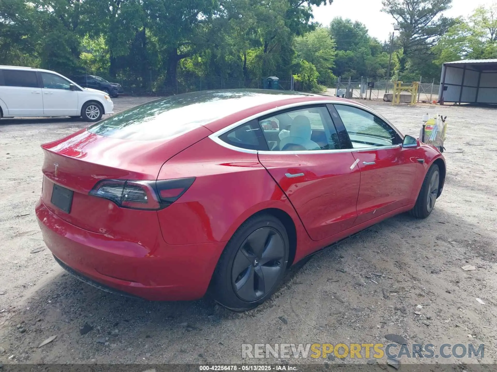 4 Photograph of a damaged car 5YJ3E1EA8LF797688 TESLA MODEL 3 2020