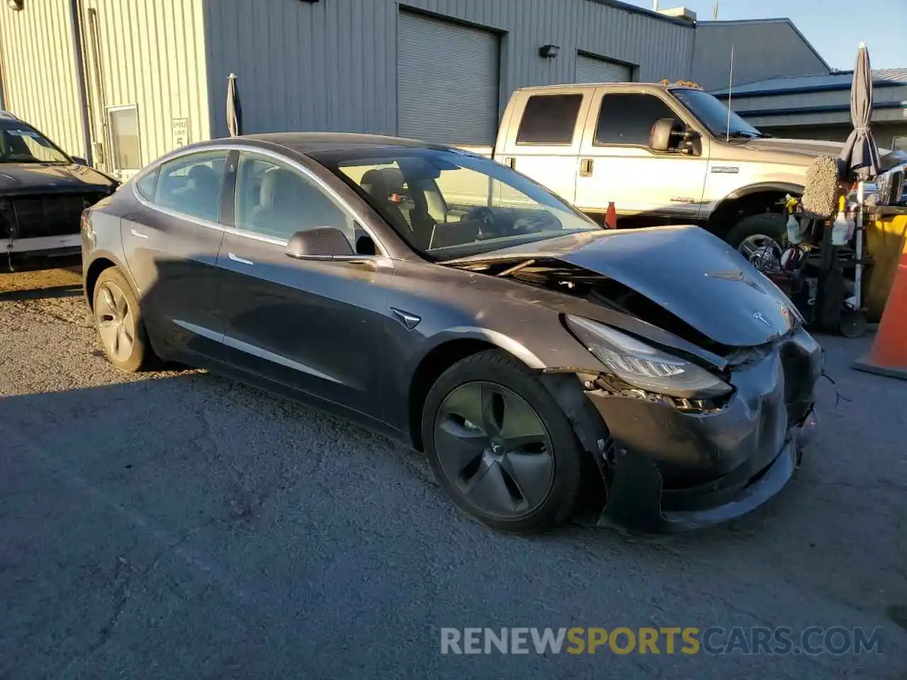 4 Photograph of a damaged car 5YJ3E1EA8LF803523 TESLA MODEL 3 2020