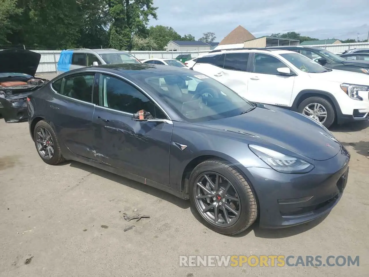4 Photograph of a damaged car 5YJ3E1EA9LF597208 TESLA MODEL 3 2020