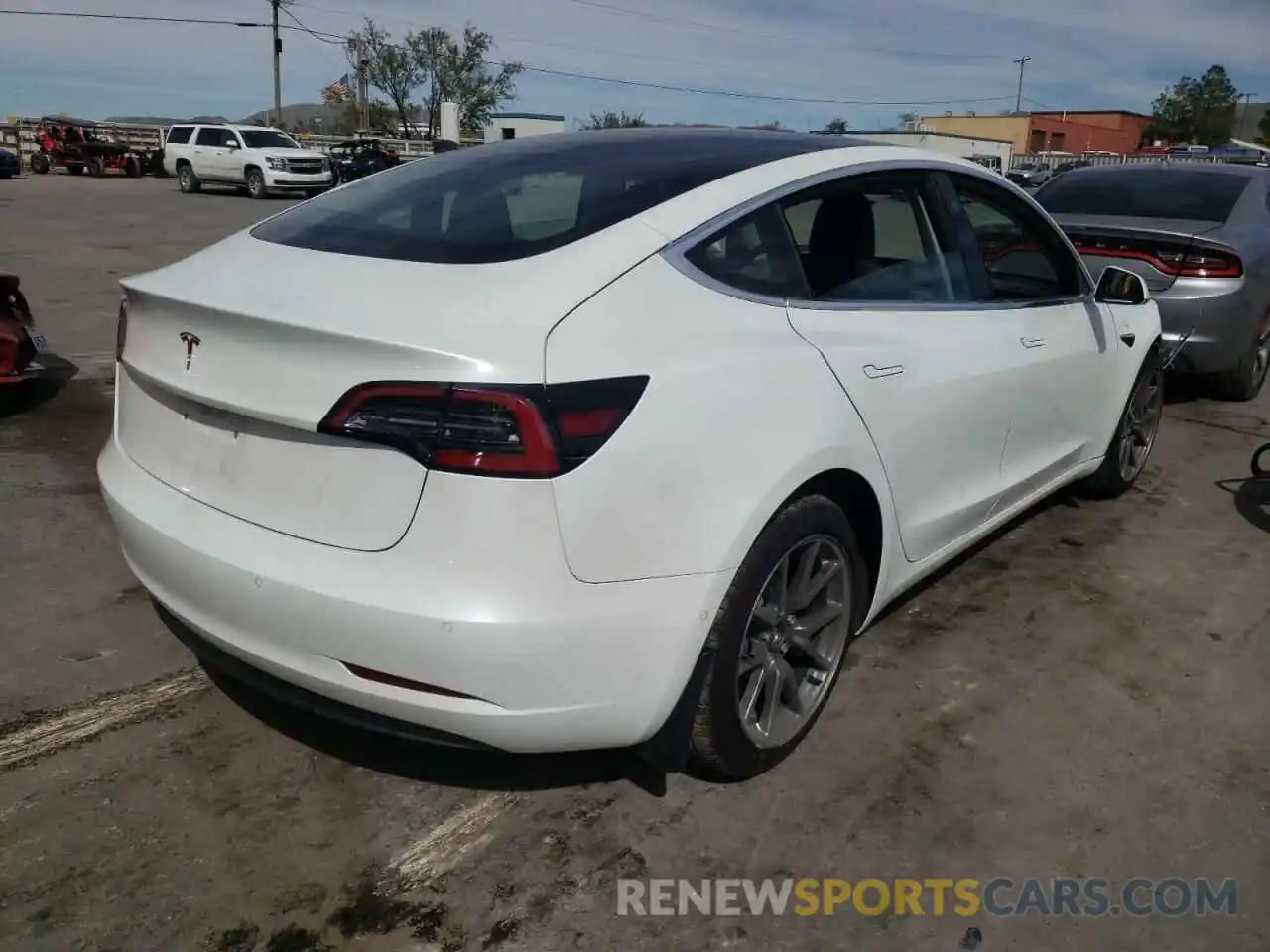 4 Photograph of a damaged car 5YJ3E1EA9LF612449 TESLA MODEL 3 2020